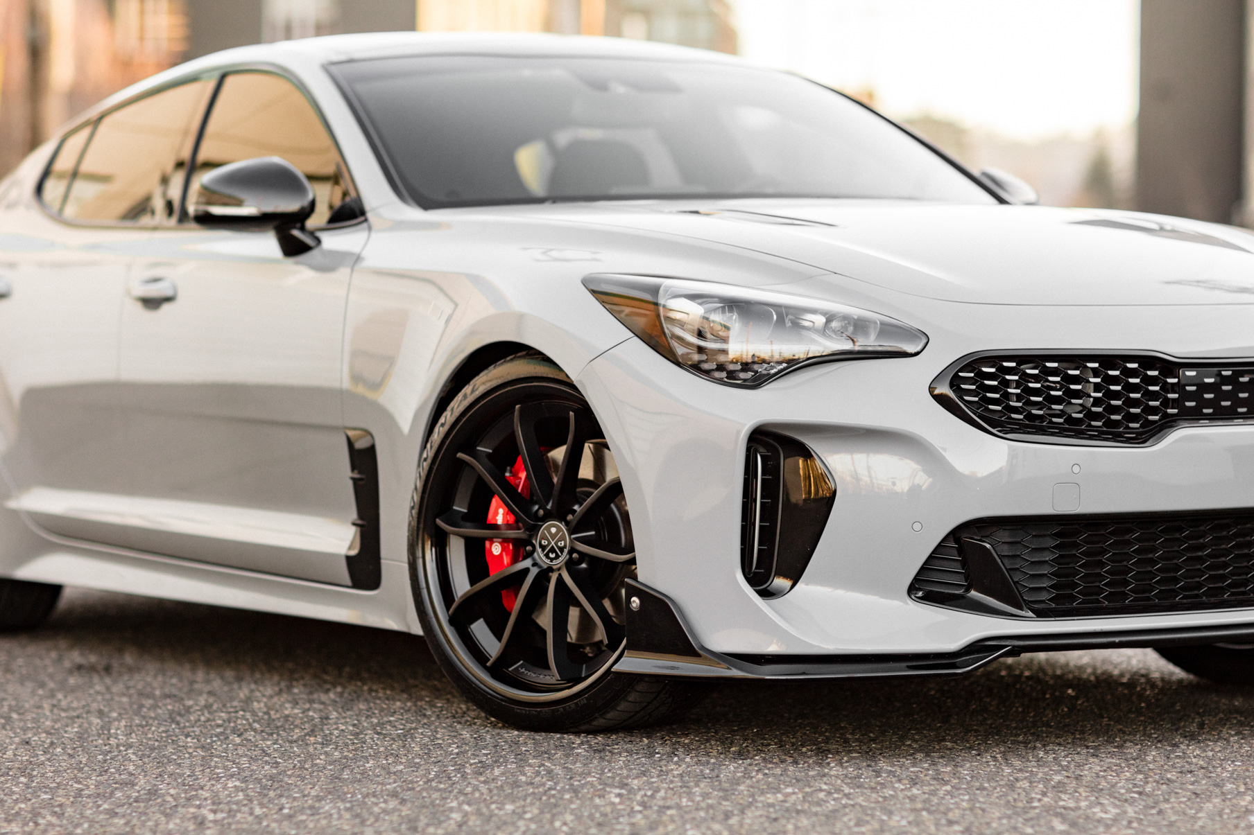 A 2018 Kia Stinger on 20 Inch Blaque Diamond BD-23 Gloss Black Wheels