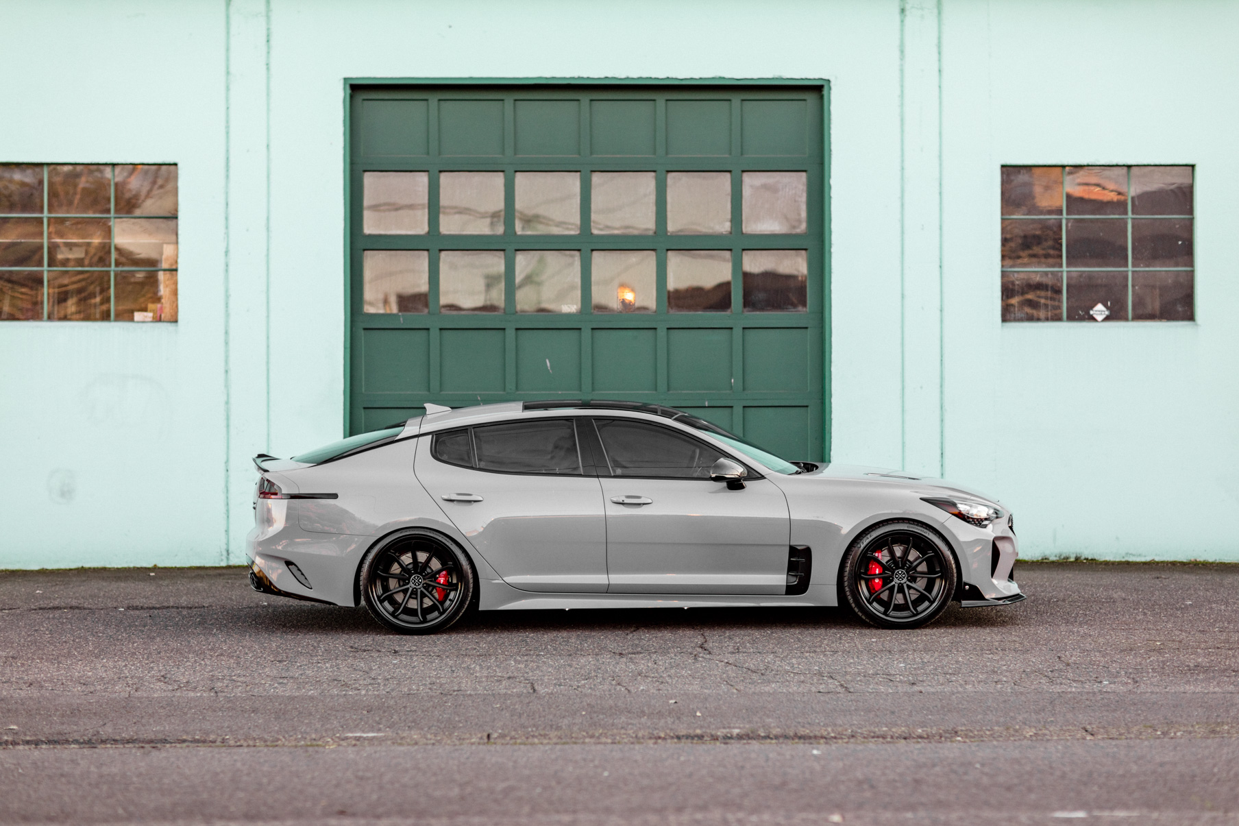 A 2018 Kia Stinger on 20 Inch Blaque Diamond BD-23 Gloss Black Wheels