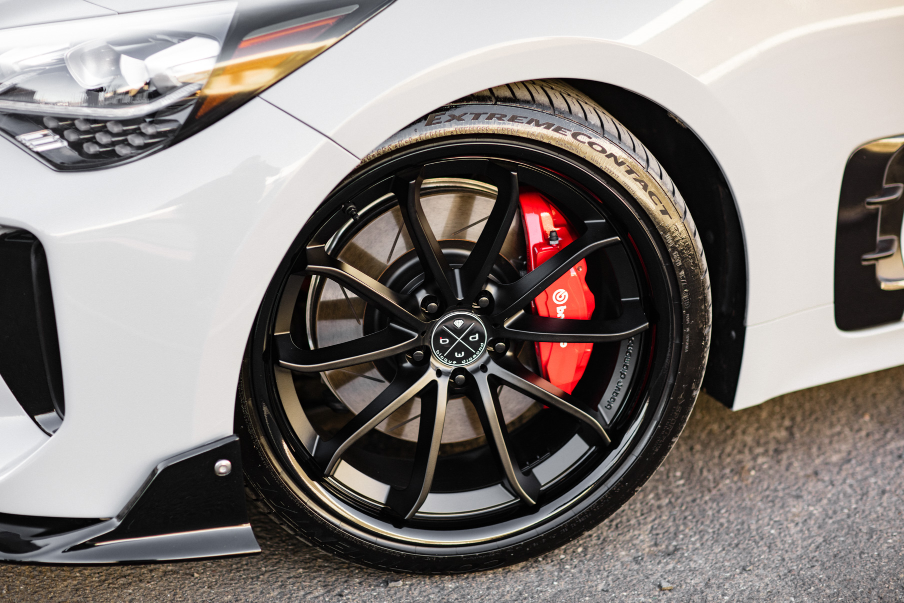 A 2018 Kia Stinger on 20 Inch Blaque Diamond BD-23 Gloss Black Wheels