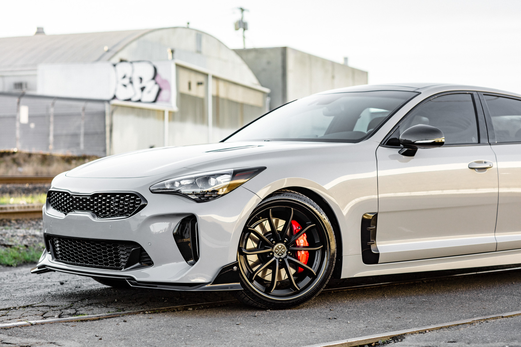A 2018 Kia Stinger on 20 Inch Blaque Diamond BD-23 Gloss Black Wheels