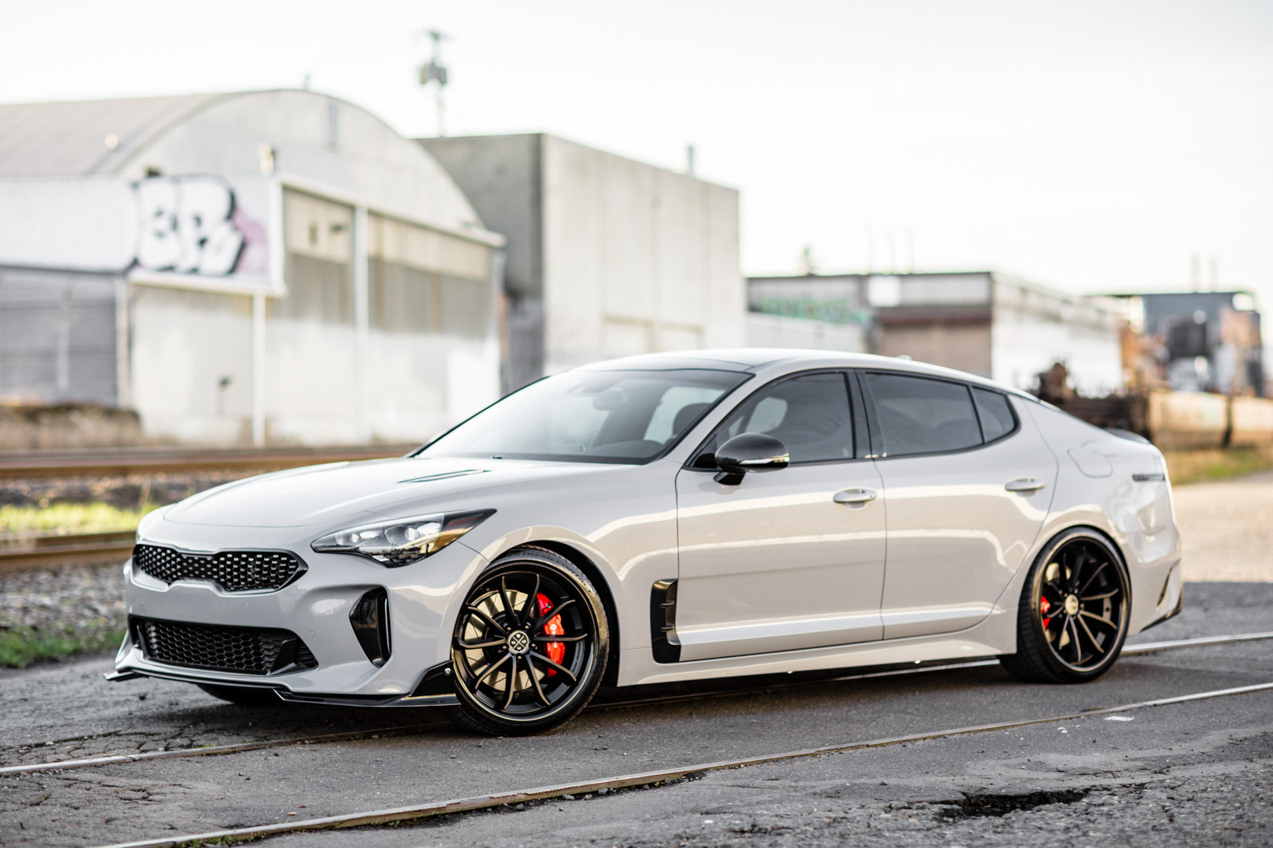 A 2018 Kia Stinger on 20 Inch Blaque Diamond BD-23 Gloss Black Wheels