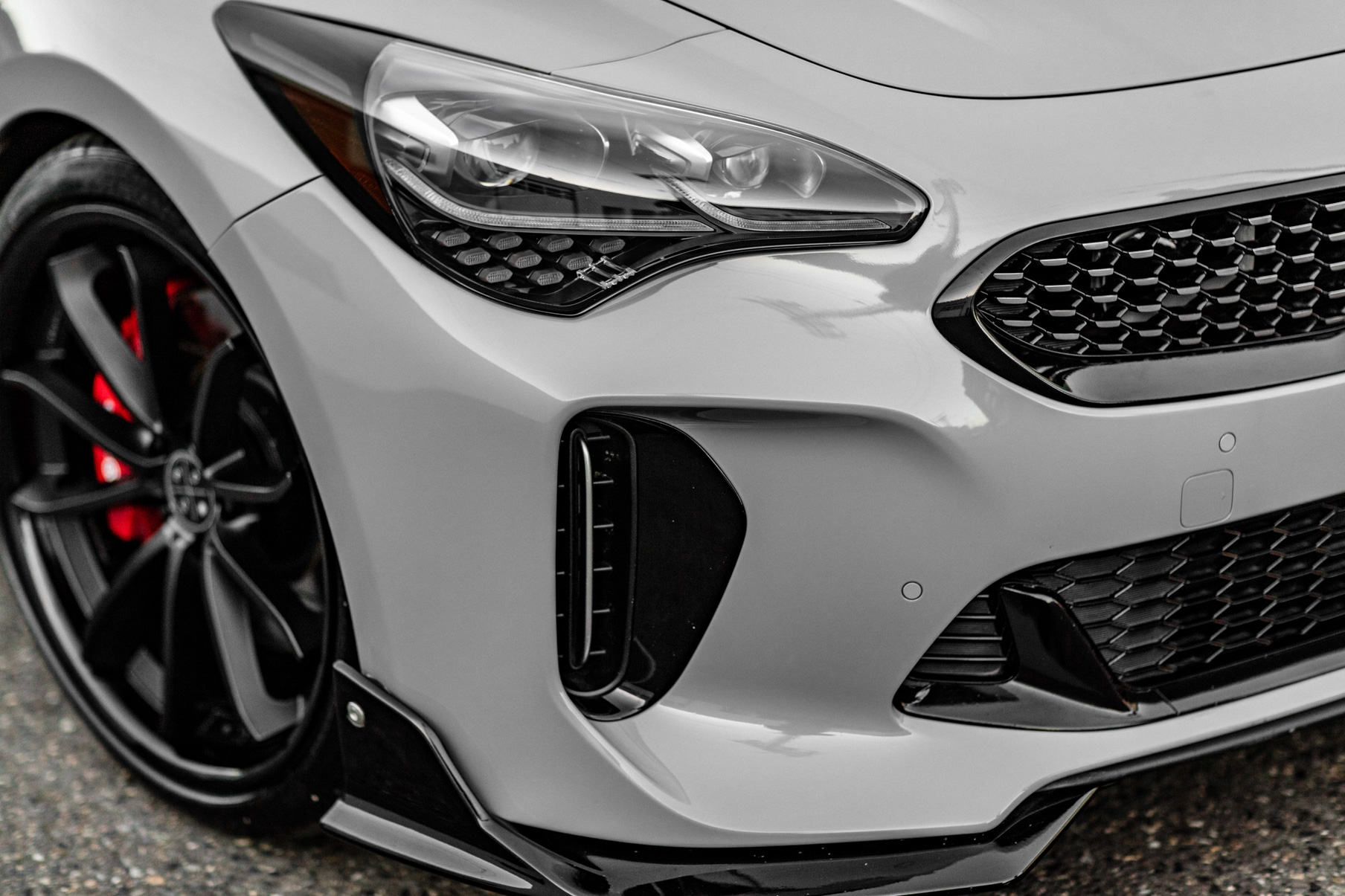 A 2018 Kia Stinger on 20 Inch Blaque Diamond BD-23 Gloss Black Wheels