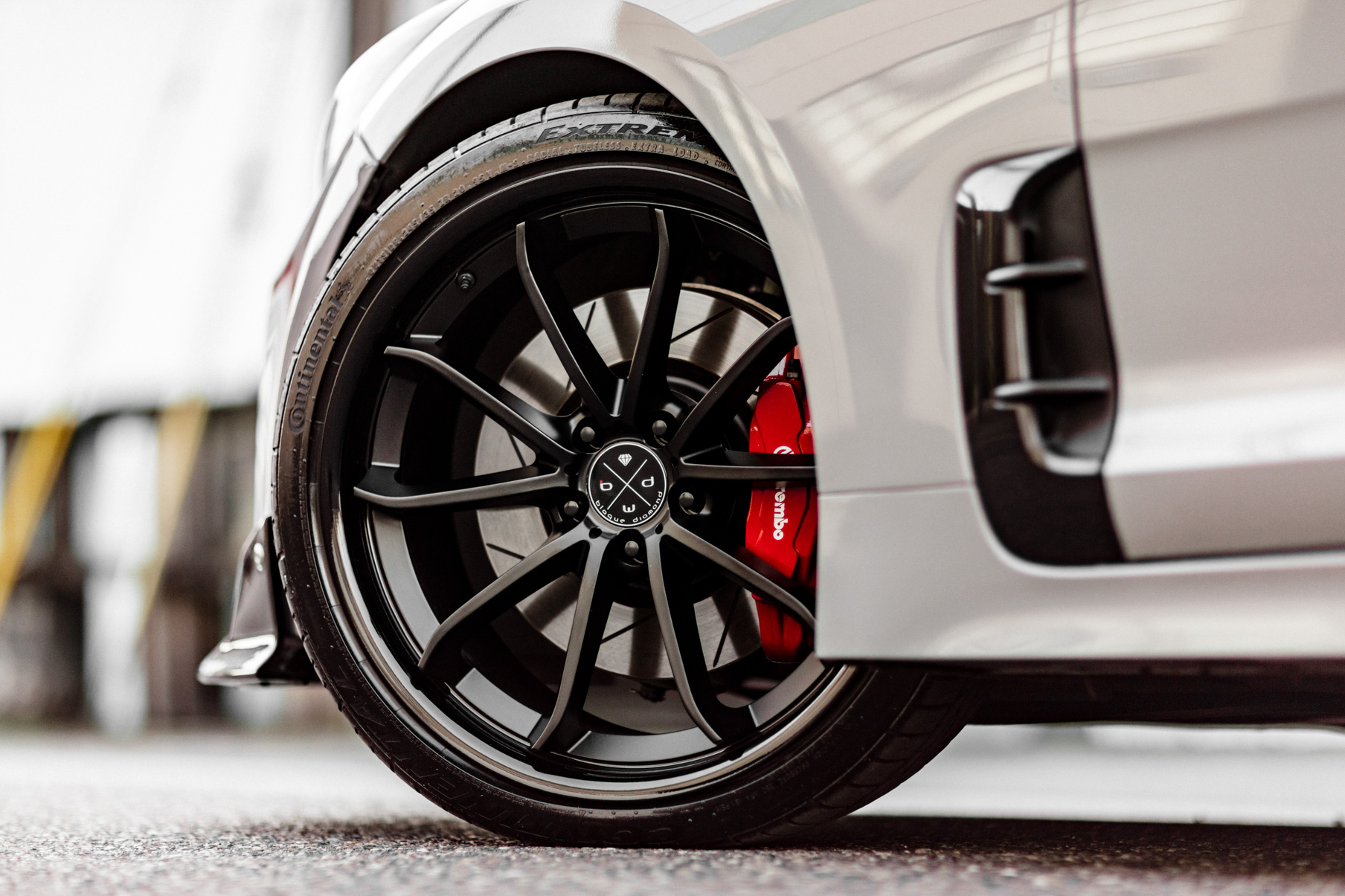 A 2018 Kia Stinger on 20 Inch Blaque Diamond BD-23 Gloss Black Wheels