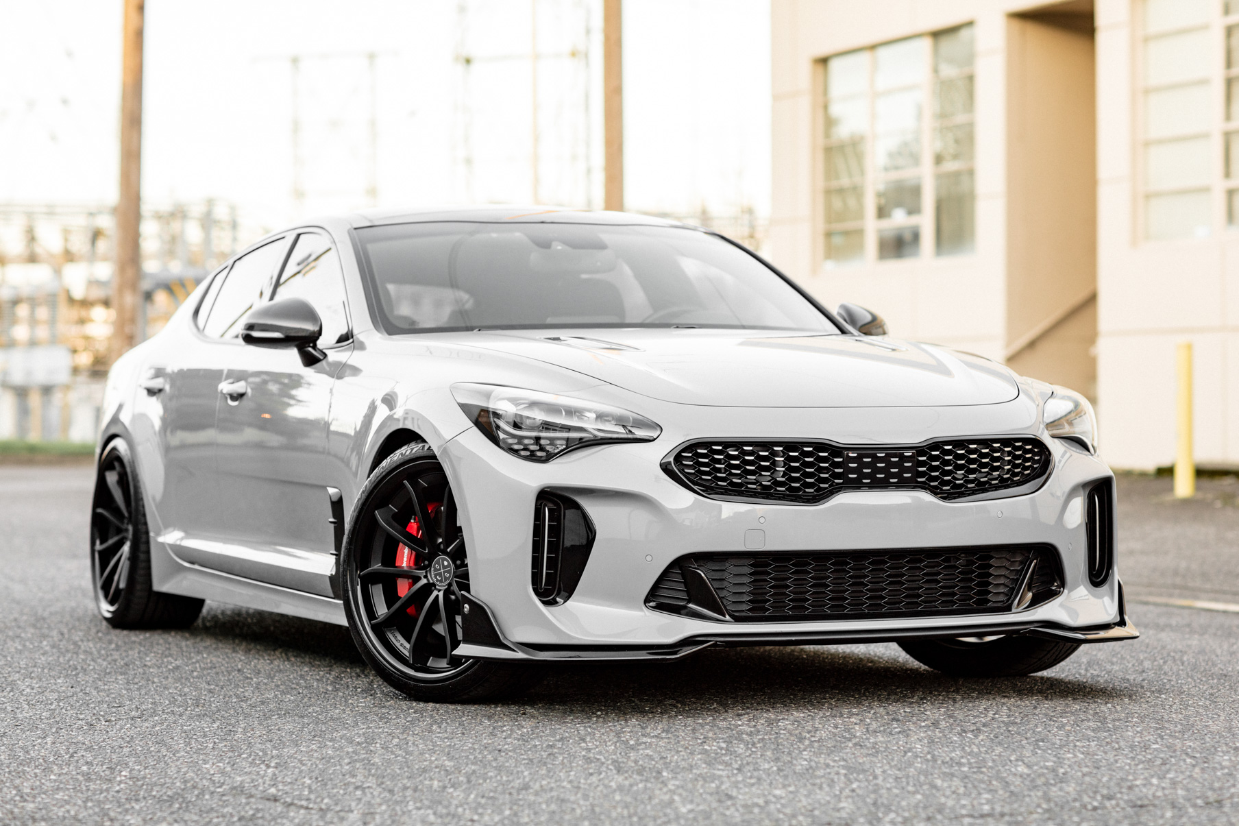 A 2018 Kia Stinger on 20 Inch Blaque Diamond BD-23 Gloss Black Wheels
