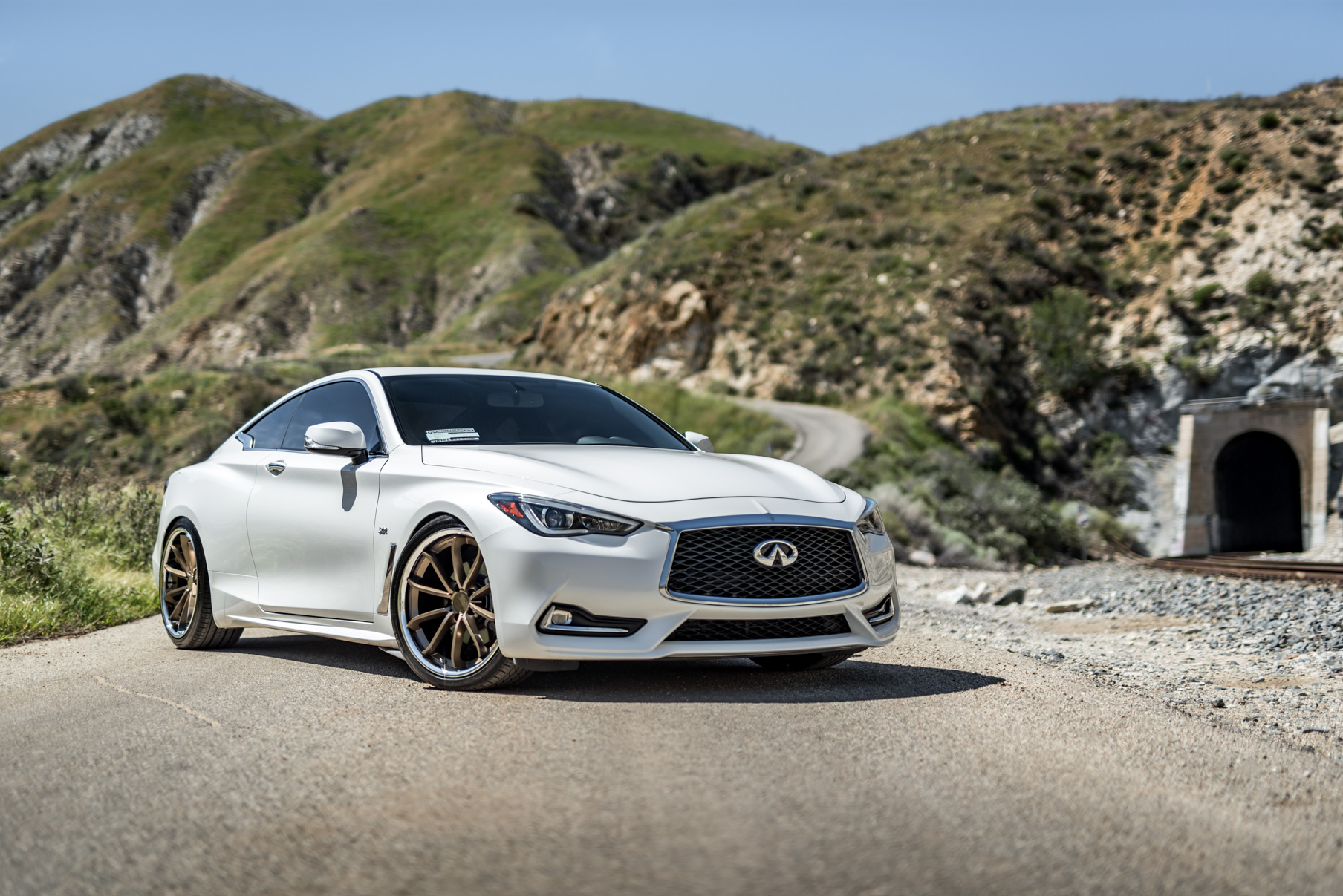 A White 2017 Infiniti Q60 on BD-23 20 Inch Bronze Chrome SS Lip Staggered Wheels