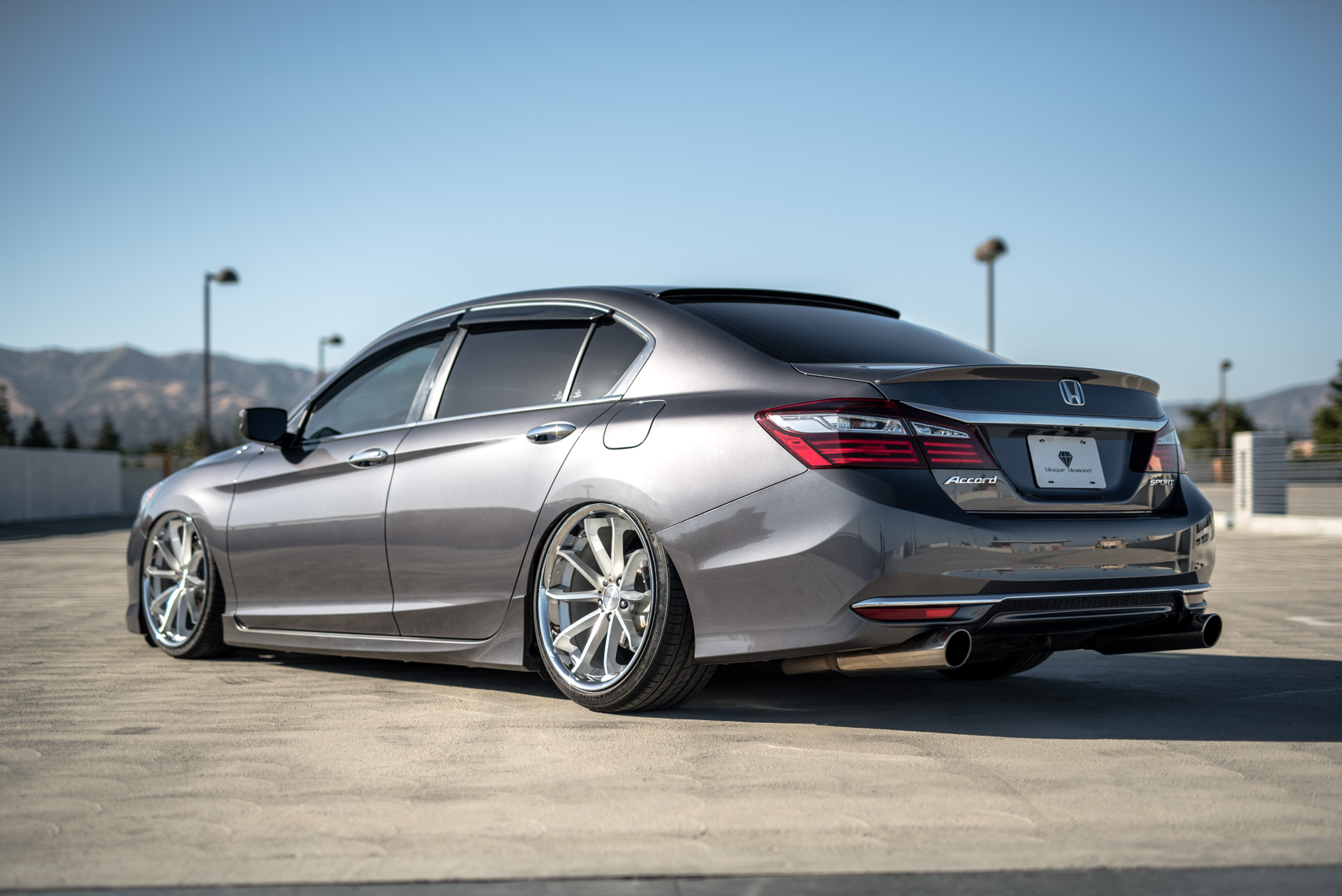 A 2016 Honda Accord on Staggered 20 Inch Blaque Diamond BD-23 Silver with Chrome SS Lip Wheels