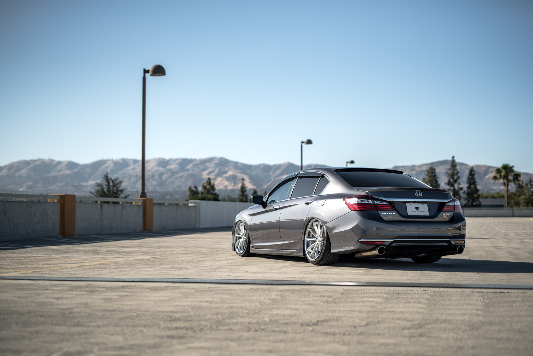 A 2016 Honda Accord on Staggered 20 Inch Blaque Diamond BD-23 Silver with Chrome SS Lip Wheels