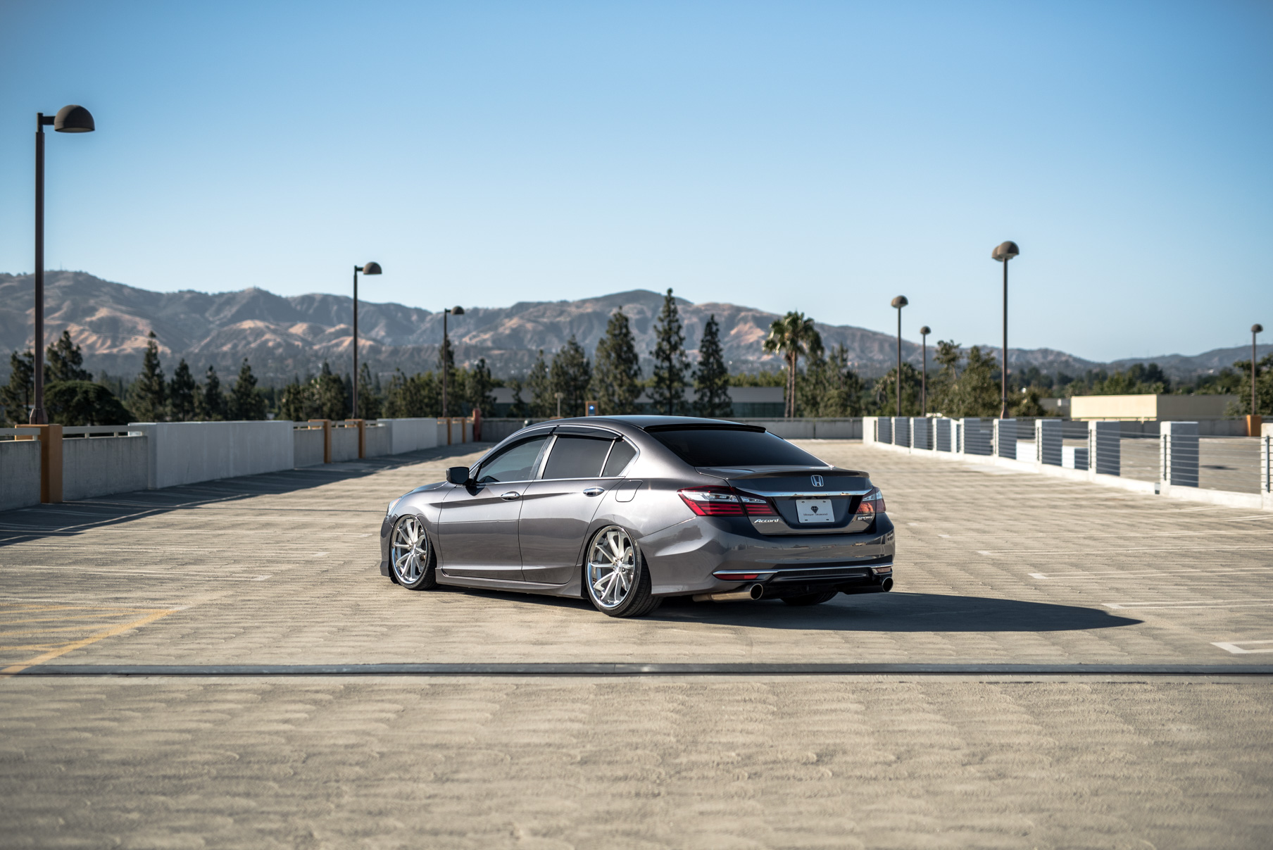 A 2016 Honda Accord on Staggered 20 Inch Blaque Diamond BD-23 Silver with Chrome SS Lip Wheels