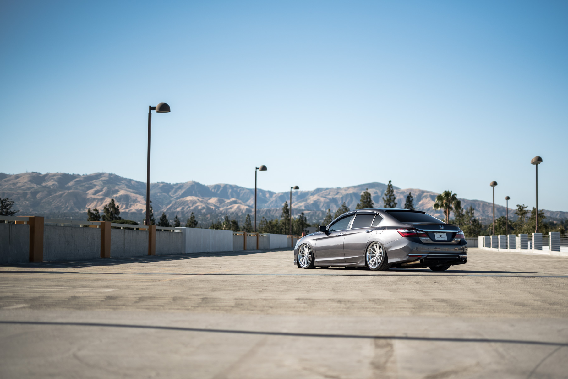 A 2016 Honda Accord on Staggered 20 Inch Blaque Diamond BD-23 Silver with Chrome SS Lip Wheels