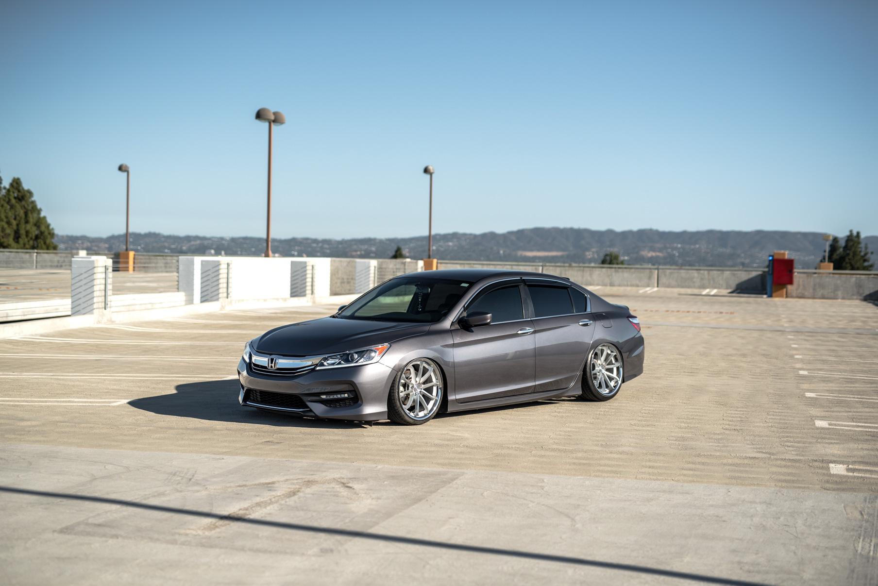 A 2016 Honda Accord on Staggered 20 Inch Blaque Diamond BD-23 Silver with Chrome SS Lip Wheels