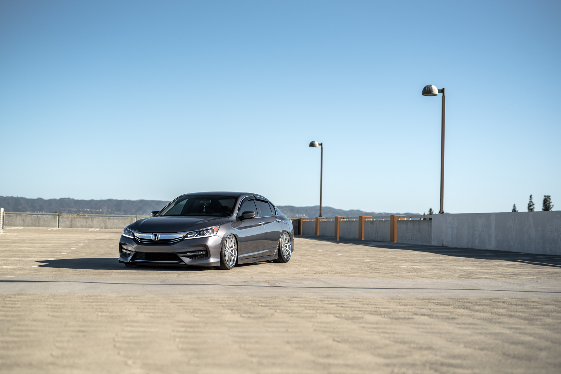 A 2016 Honda Accord on Staggered 20 Inch Blaque Diamond BD-23 Silver with Chrome SS Lip Wheels