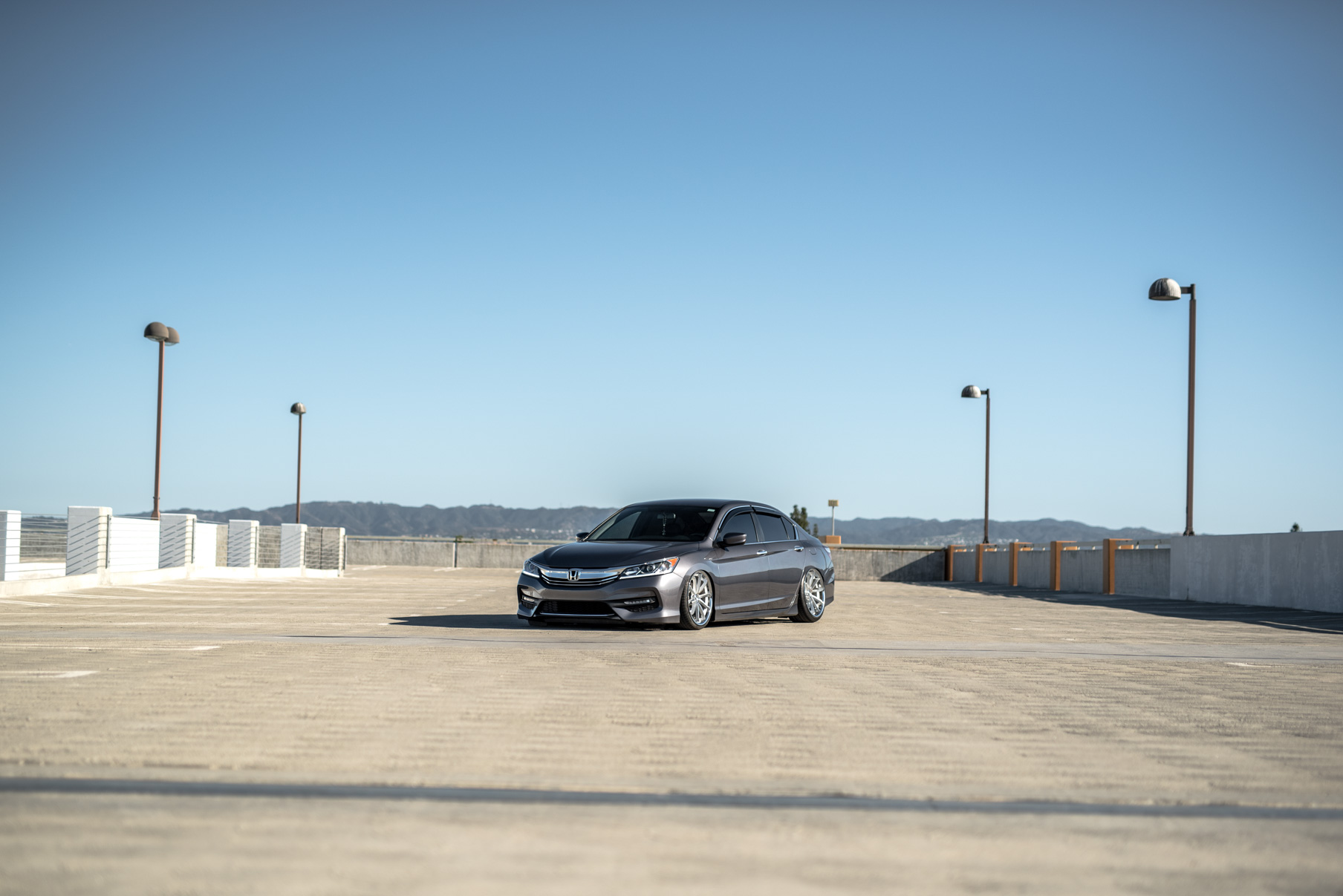 A 2016 Honda Accord on Staggered 20 Inch Blaque Diamond BD-23 Silver with Chrome SS Lip Wheels