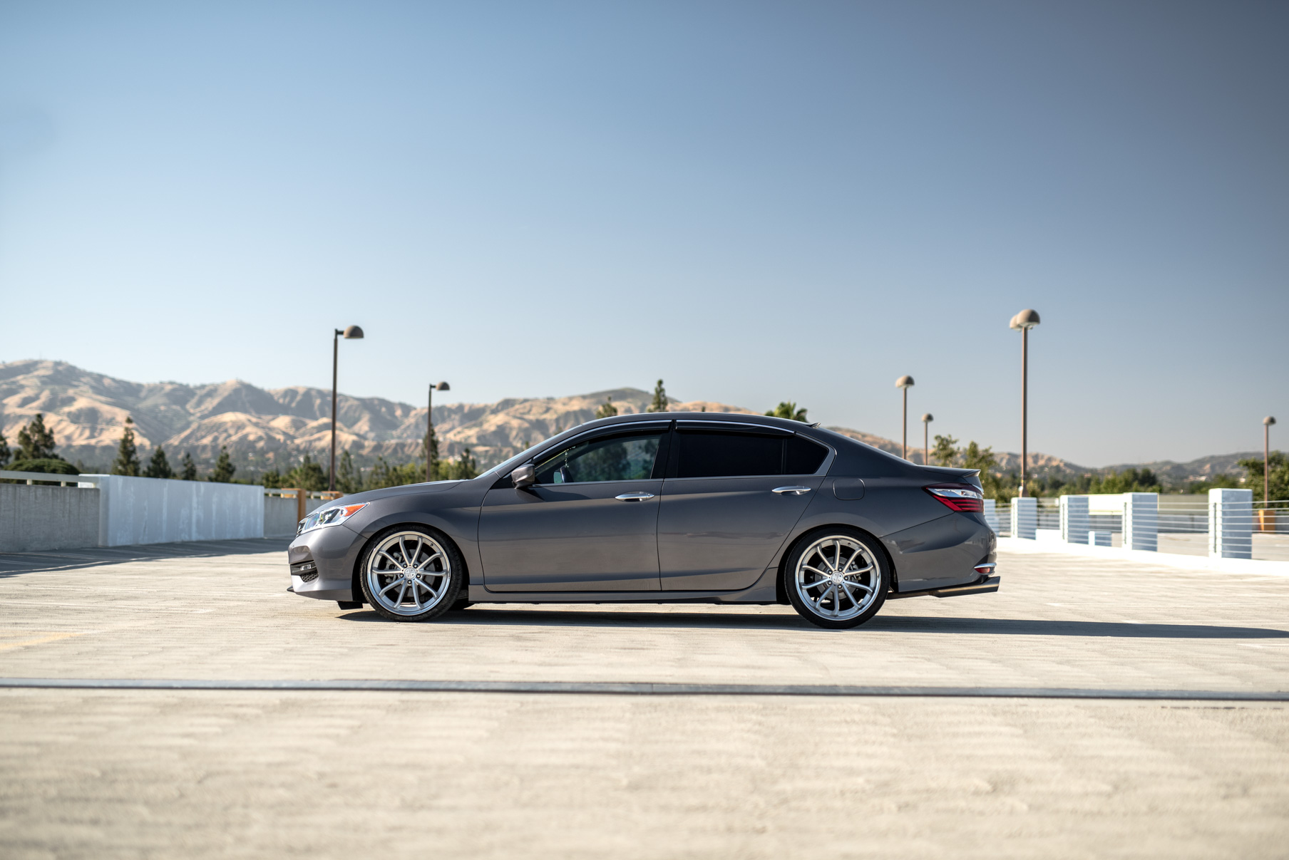 A 2016 Honda Accord on Staggered 20 Inch Blaque Diamond BD-23 Silver with Chrome SS Lip Wheels