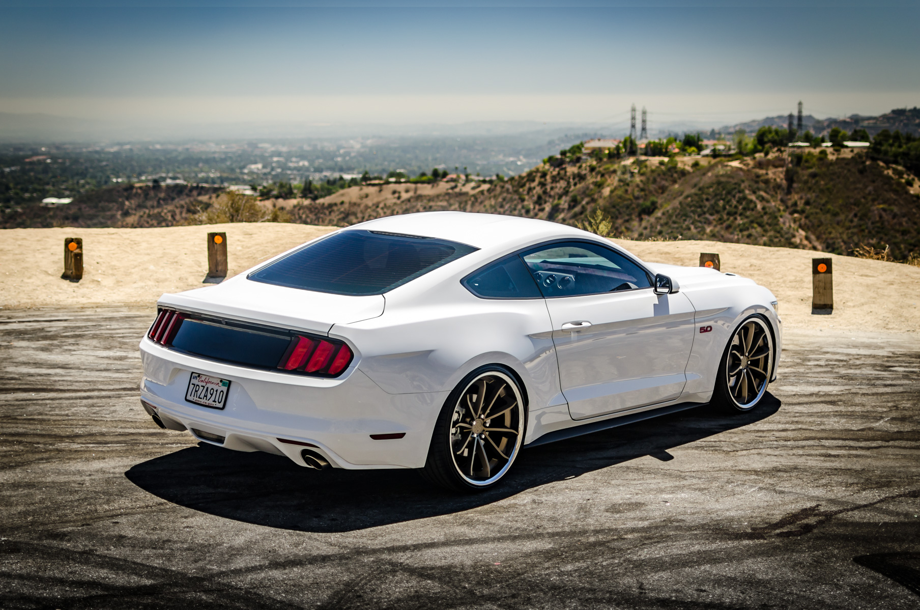 A White 2015 Ford Mustang GT On 20 Inch Blaque Diamond BD-23 Bronze Wheels