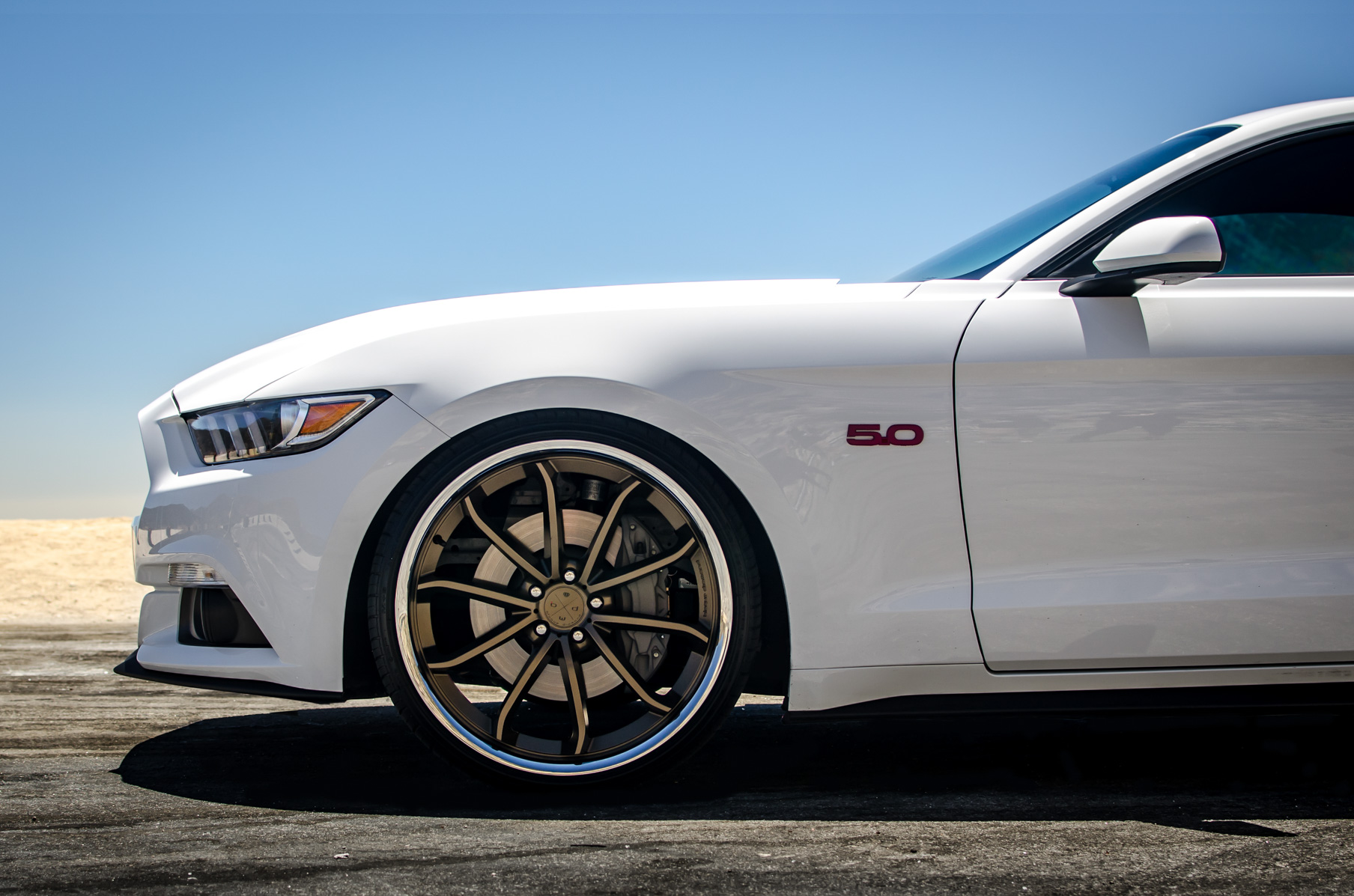 A White 2015 Ford Mustang GT On 20 Inch Blaque Diamond BD-23 Bronze Wheels