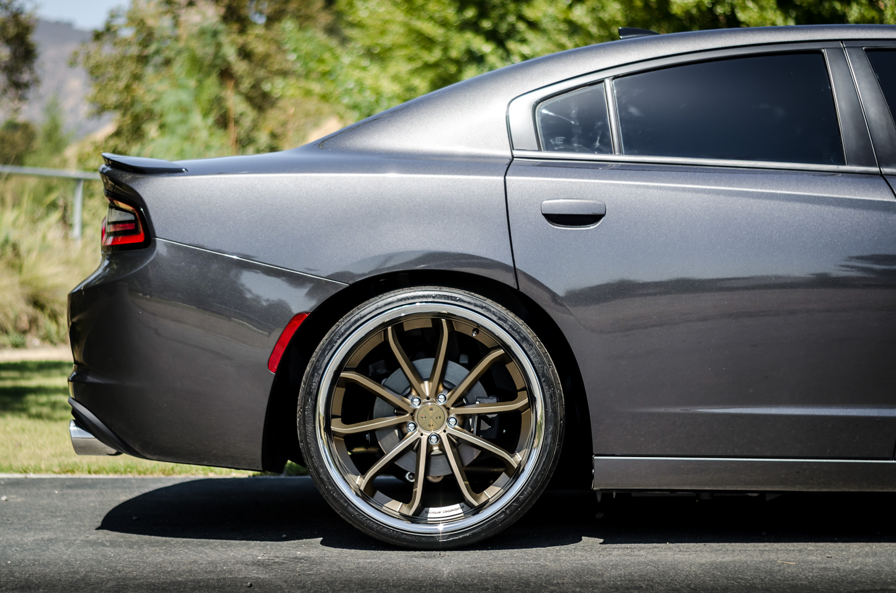 A 2016 Dodge Charger RT on 22 Inch Blaque Diamond BD-23 Bronze with SS Lip Wheels