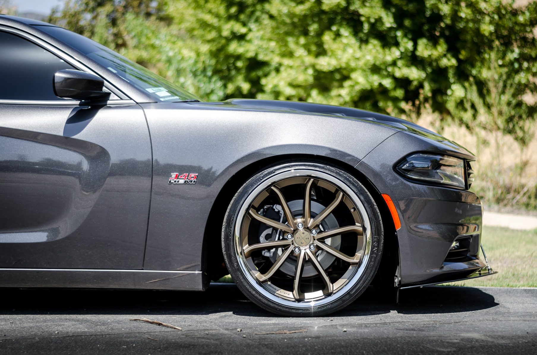 A 2016 Dodge Charger RT on 22 Inch Blaque Diamond BD-23 Bronze with SS Lip Wheels