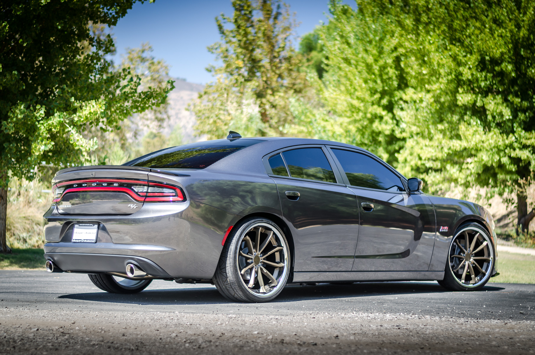 A 2016 Dodge Charger RT on 22 Inch Blaque Diamond BD-23 Bronze with SS Lip Wheels