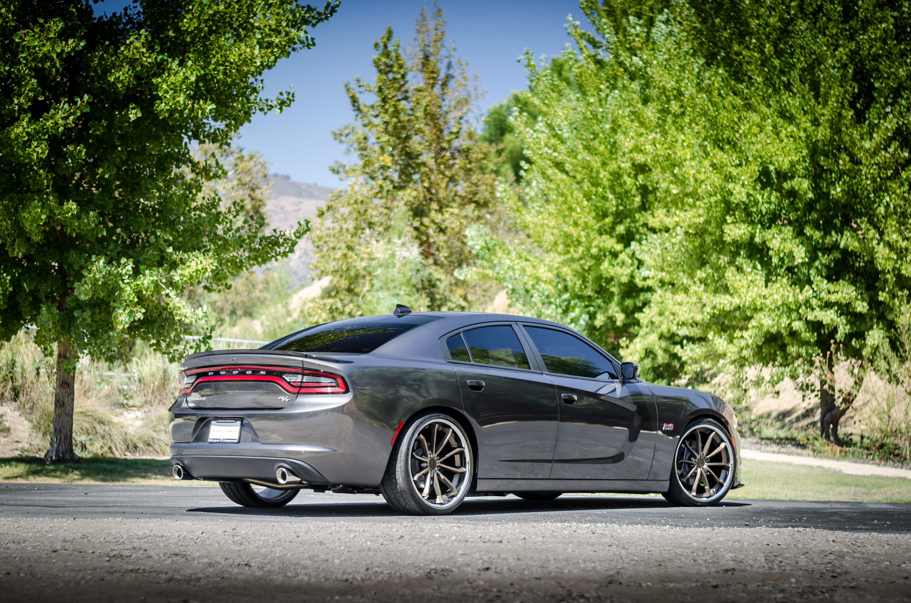 A 2016 Dodge Charger RT on 22 Inch Blaque Diamond BD-23 Bronze with SS Lip Wheels