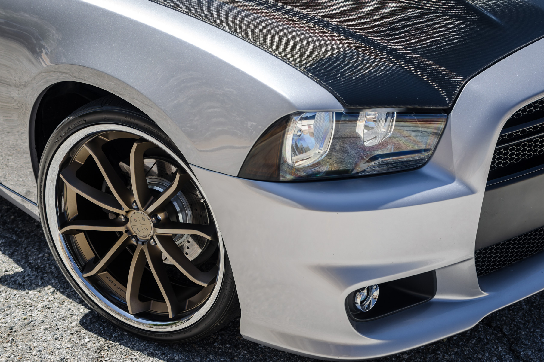 A 2014 Dodge Charger on 22 Inch Blaque Diamond BD-23 Bronze with SS Lip Wheels