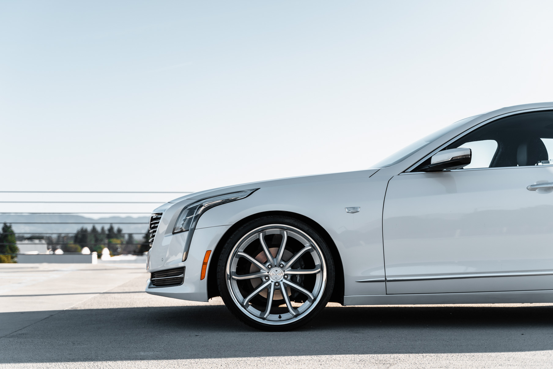 A 2016 Cadillac CT6 on Blaque Diamond BD-23 Silver Machined with Chrome Lip Wheels