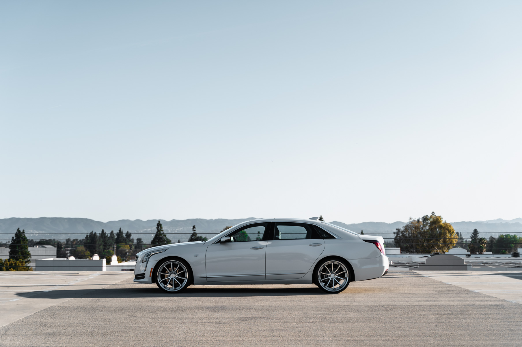 A 2016 Cadillac CT6 on Blaque Diamond BD-23 Silver Machined with Chrome Lip Wheels