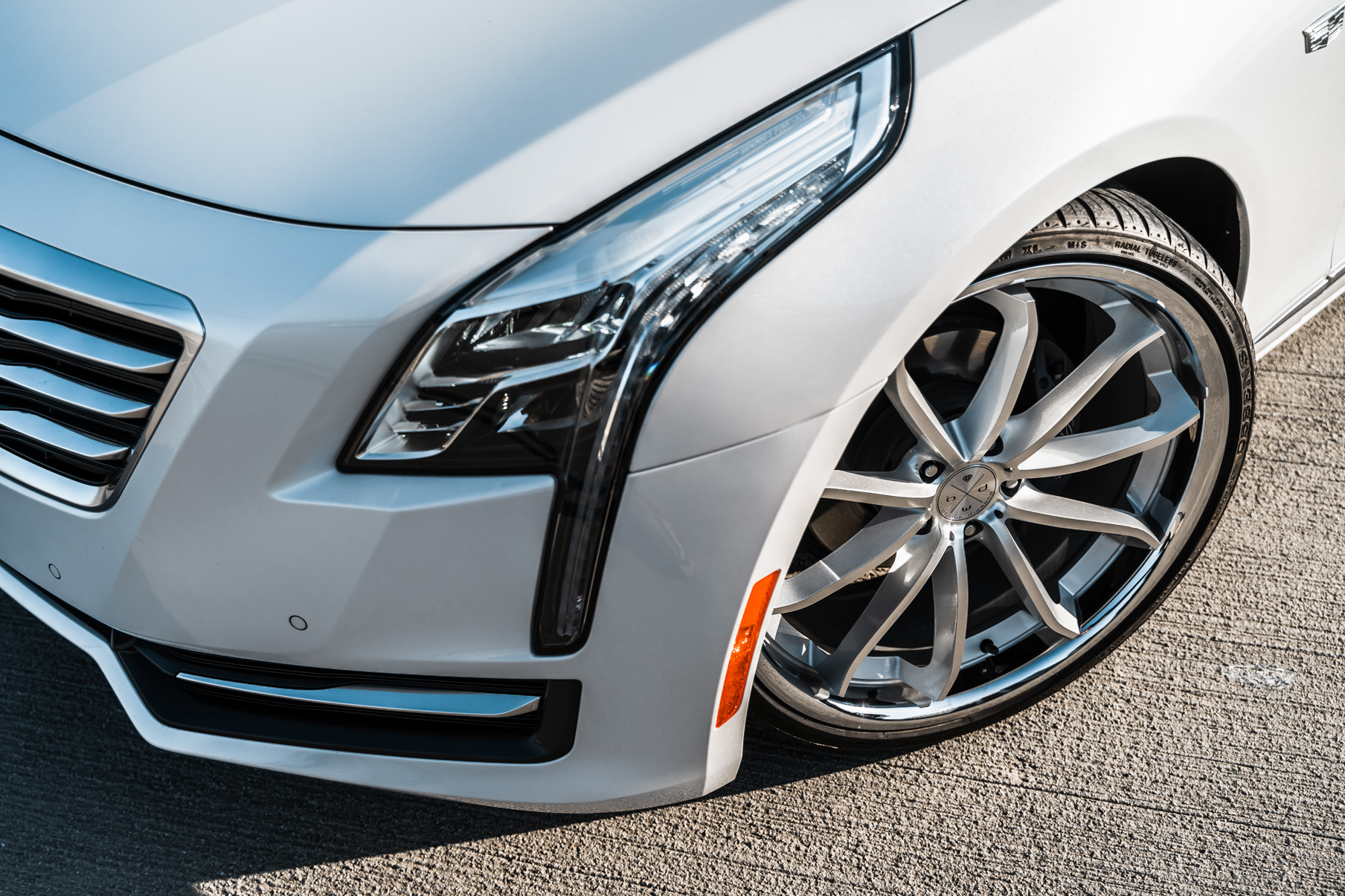 A 2016 Cadillac CT6 on Blaque Diamond BD-23 Silver Machined with Chrome Lip Wheels