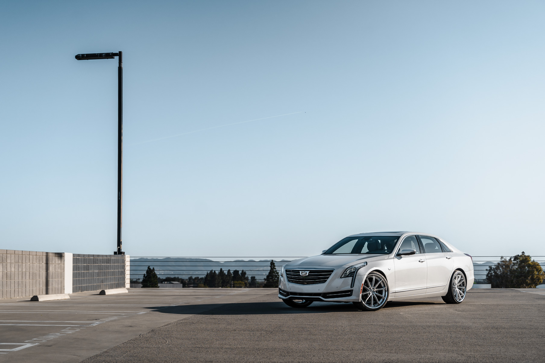 A 2016 Cadillac CT6 on Blaque Diamond BD-23 Silver Machined with Chrome Lip Wheels