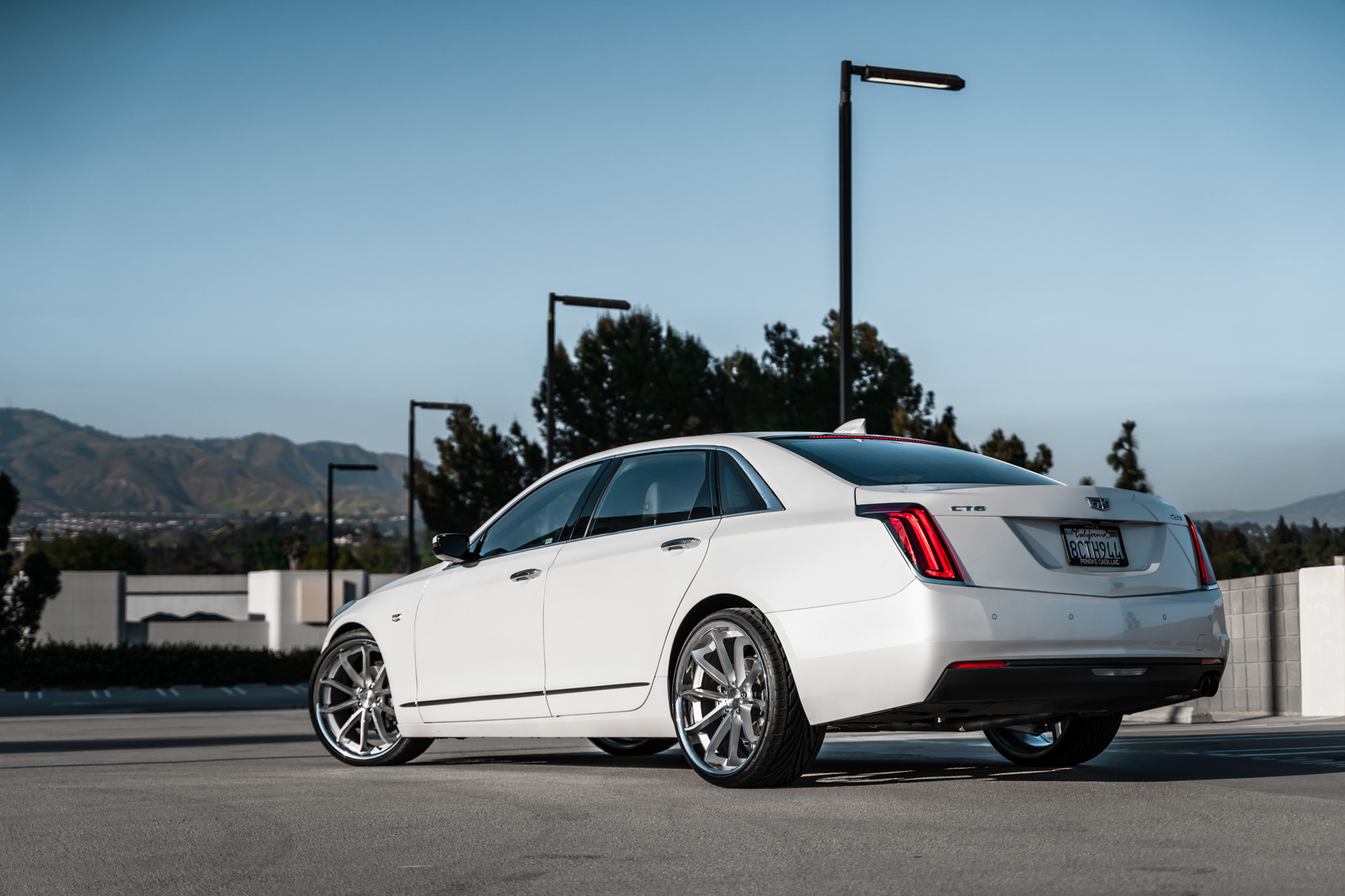 A 2016 Cadillac CT6 on Blaque Diamond BD-23 Silver Machined with Chrome Lip Wheels