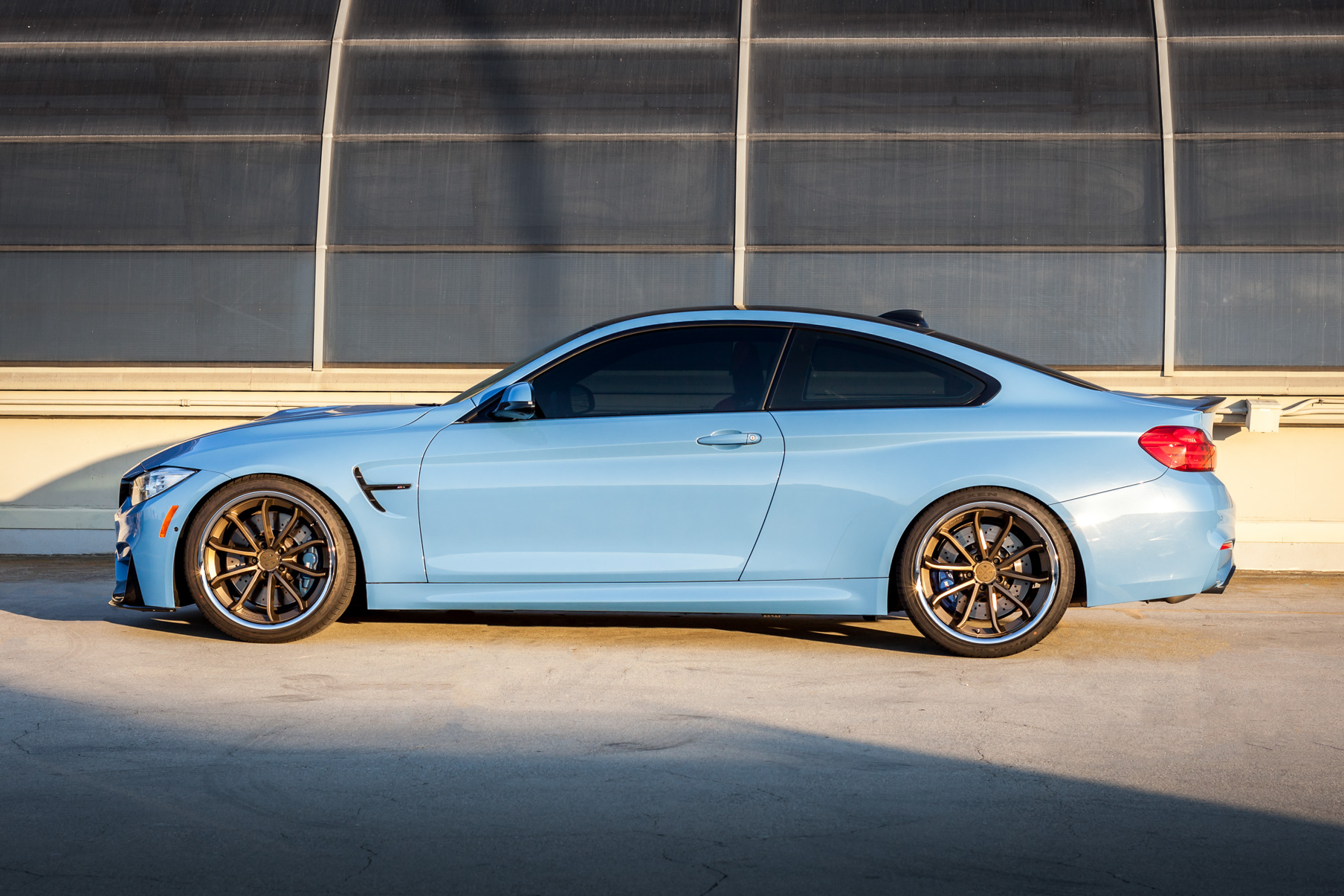 A BMW M4 on 20 Inch Blaque Diamond BD-23 Bronze Wheels