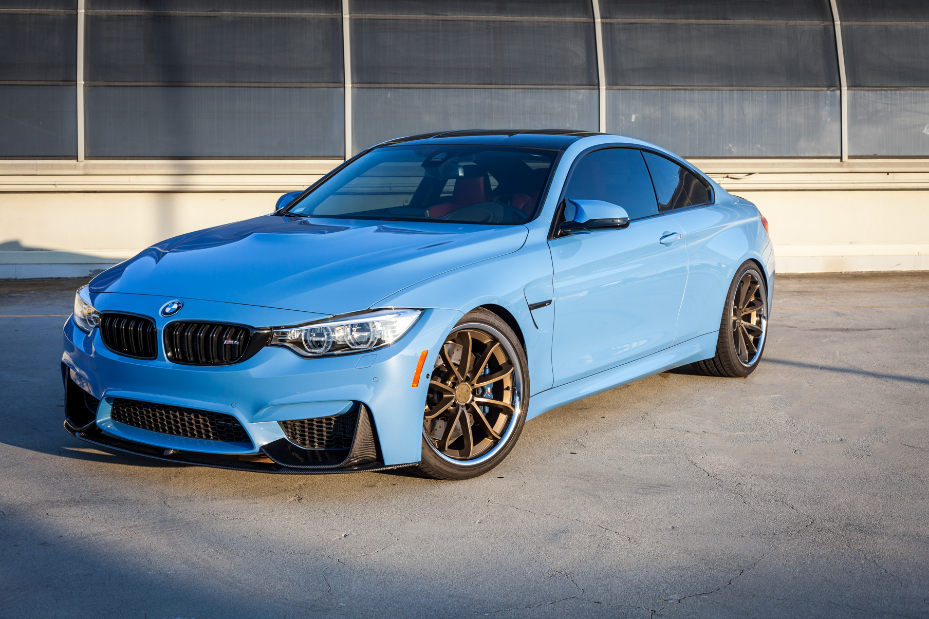 A BMW M4 on 20 Inch Blaque Diamond BD-23 Bronze Wheels