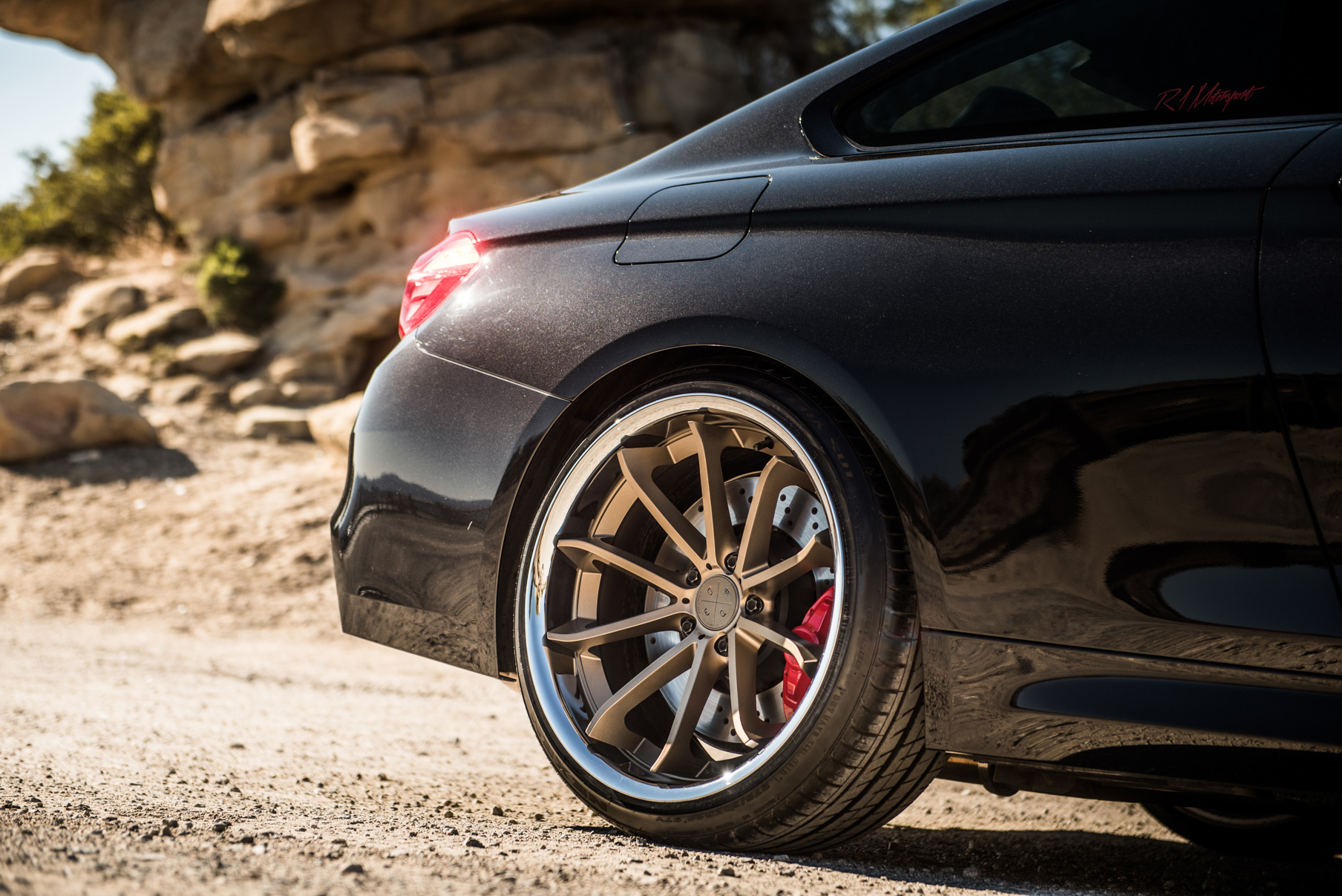 A 2015 BMW M4 on Staggered Blaque Diamond BD-23 Matte Bronze Wheels