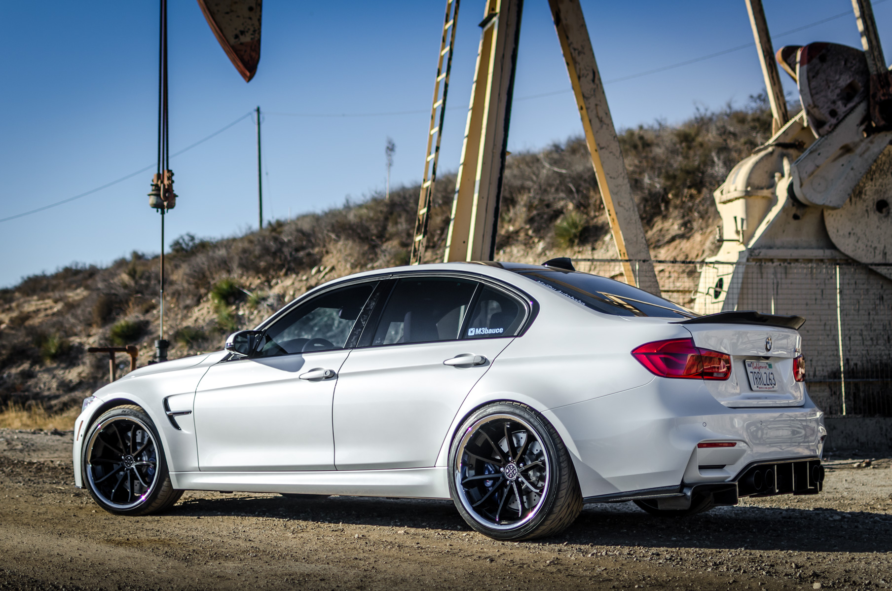 A 2016 BMW M3 on 20 Inch Blaque Diamond BD-23 Black with SS Lip Wheels