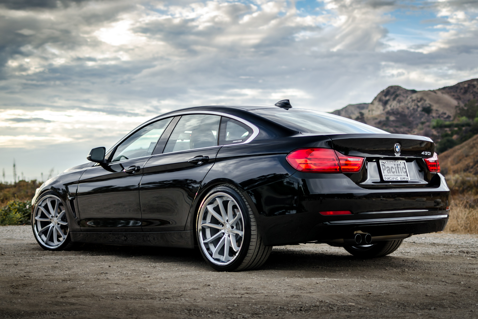 A 2016 BMW 430i on 20 Inch Blaque Diamond BD-23 Silver with Chrome SS Lip Wheels