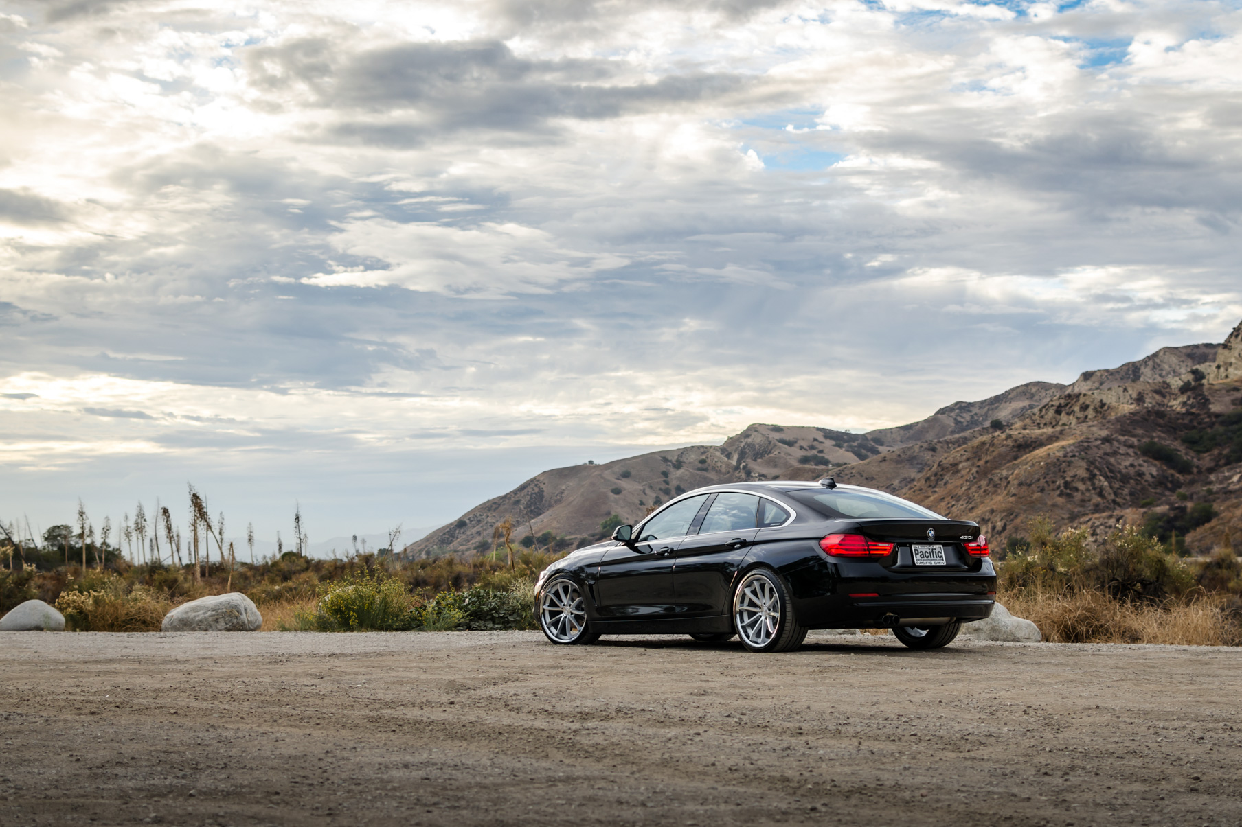 A 2016 BMW 430i on 20 Inch Blaque Diamond BD-23 Silver with Chrome SS Lip Wheels
