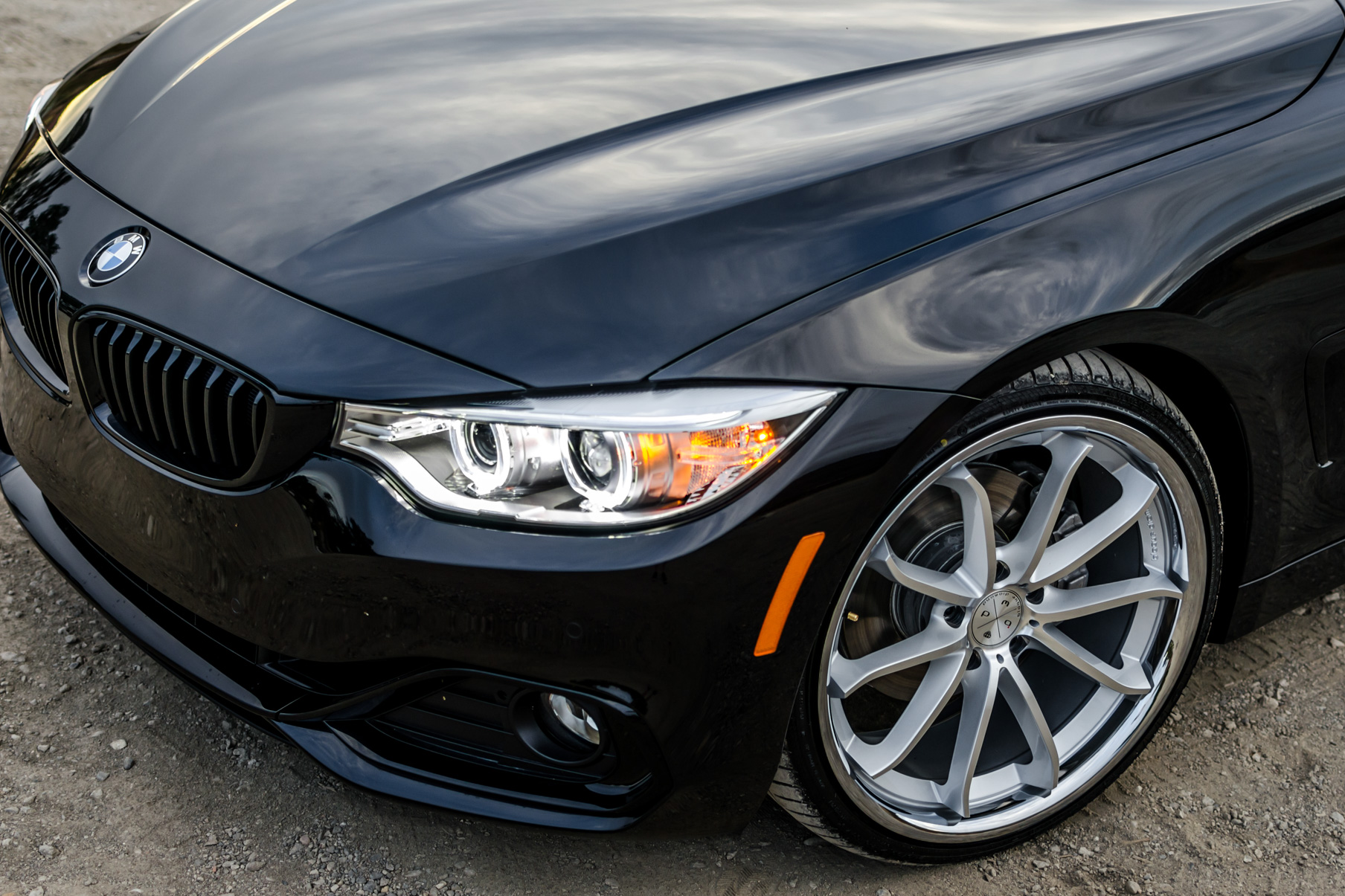 A 2016 BMW 430i on 20 Inch Blaque Diamond BD-23 Silver with Chrome SS Lip Wheels