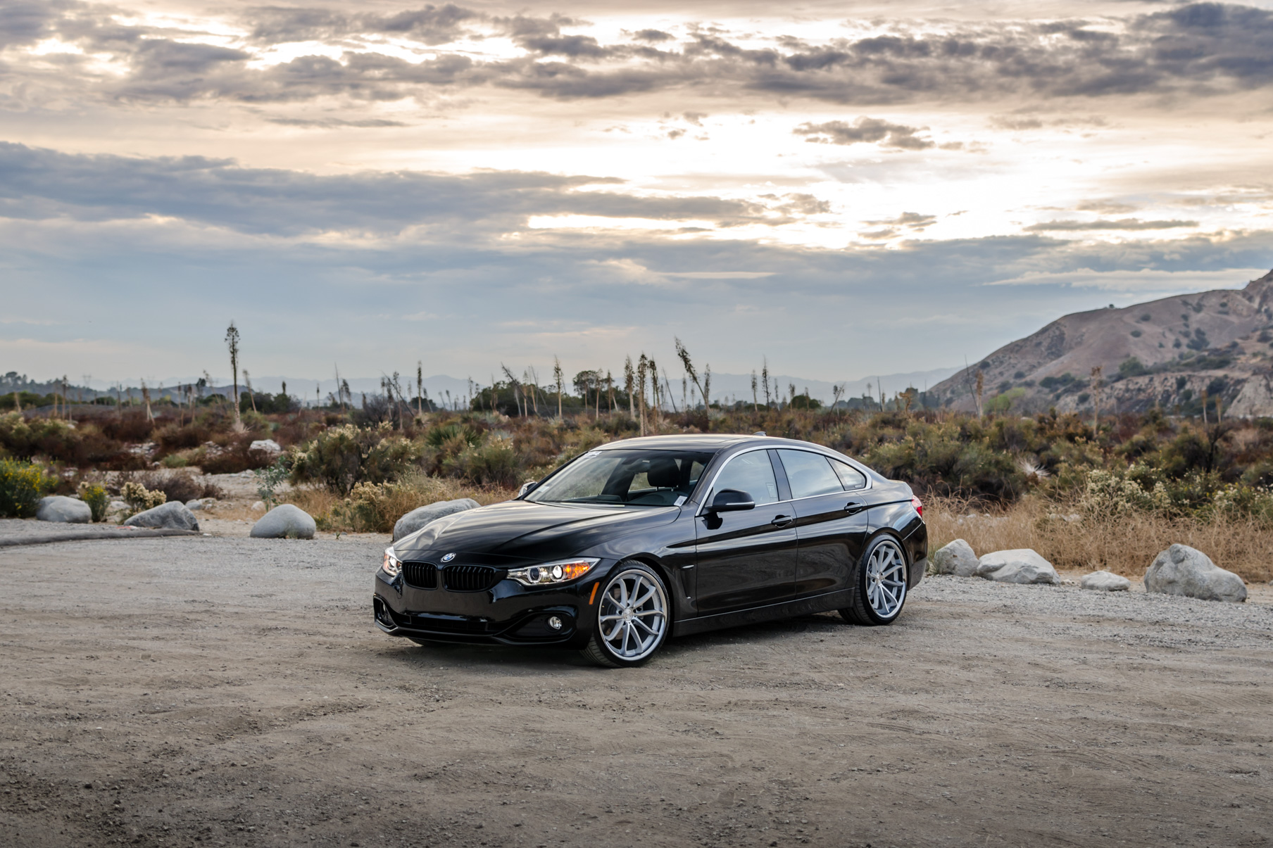 A 2016 BMW 430i on 20 Inch Blaque Diamond BD-23 Silver with Chrome SS Lip Wheels