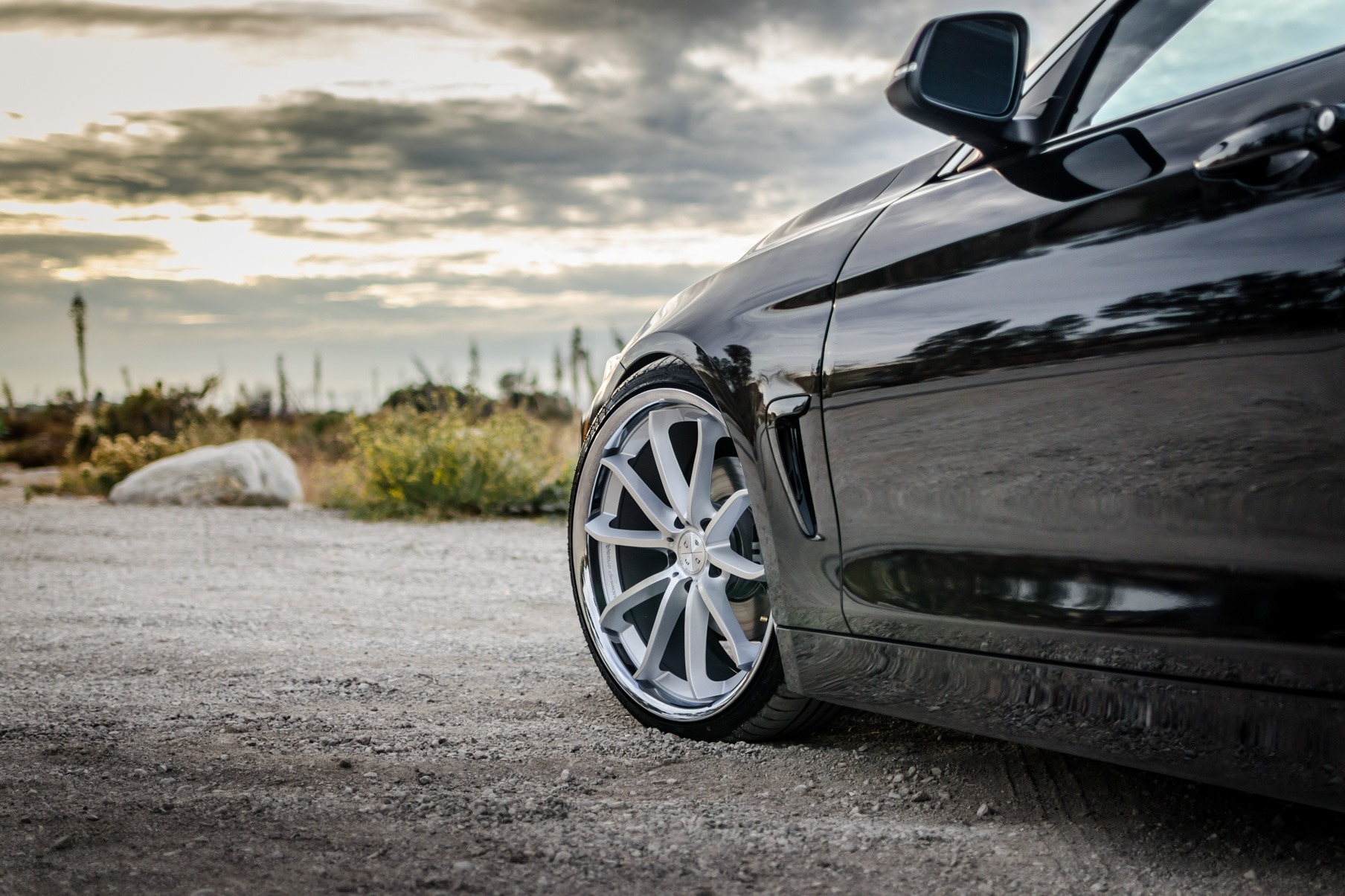 A 2016 BMW 430i on 20 Inch Blaque Diamond BD-23 Silver with Chrome SS Lip Wheels