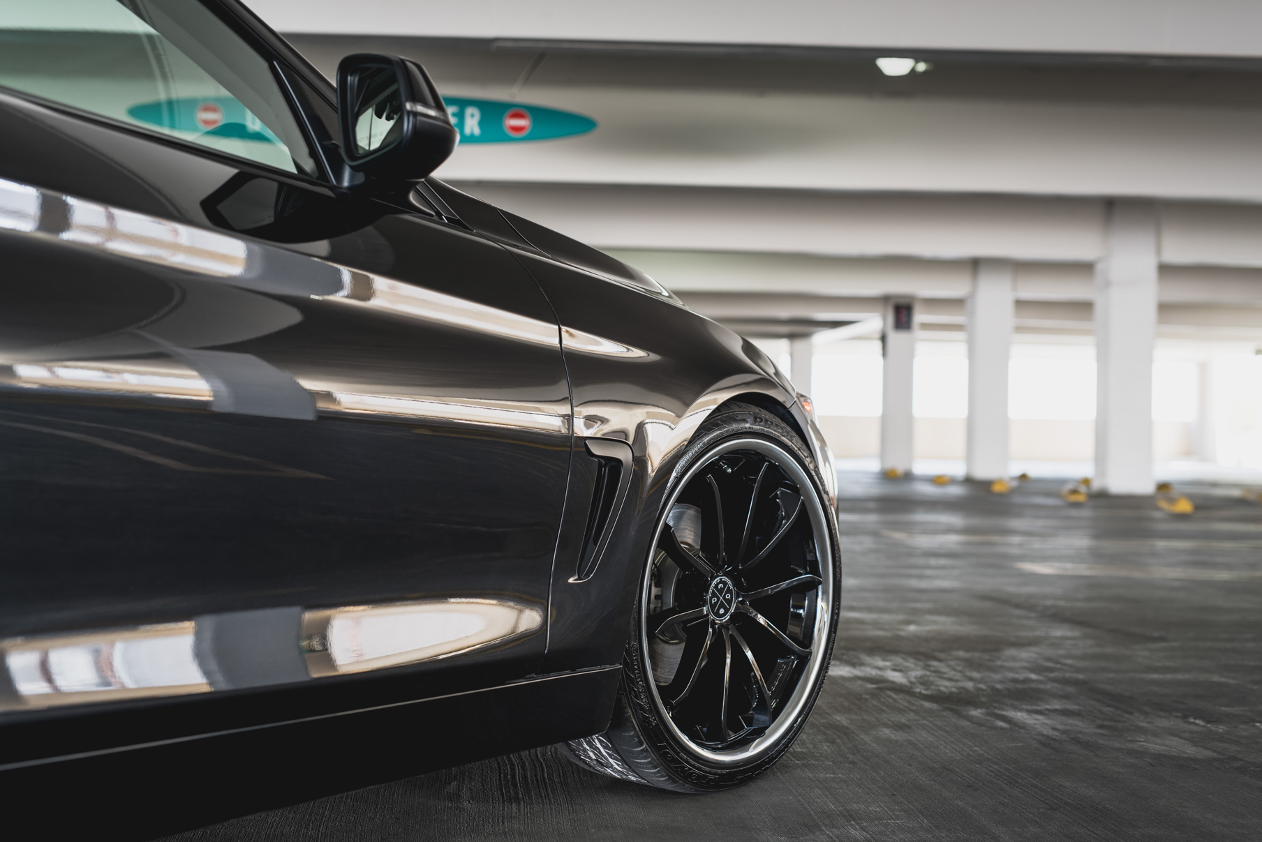 A 2014 BMW 428i on Staggered Blaque Diamond BD-23 Black with Chrome Lip Wheels