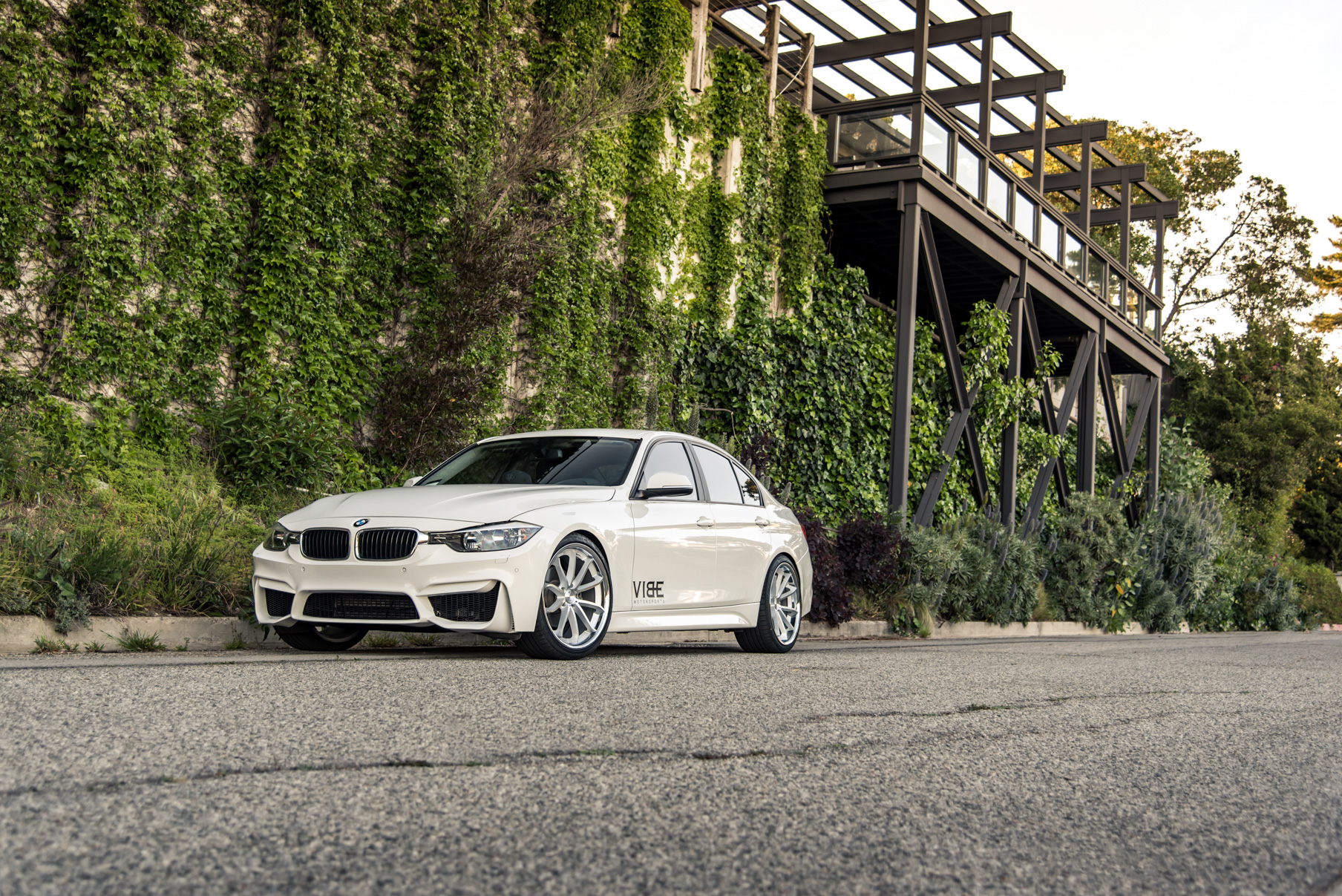 A 2014 BMW 328i on 20 Inch Staggered Silver with Chrome SS Lip Wheels