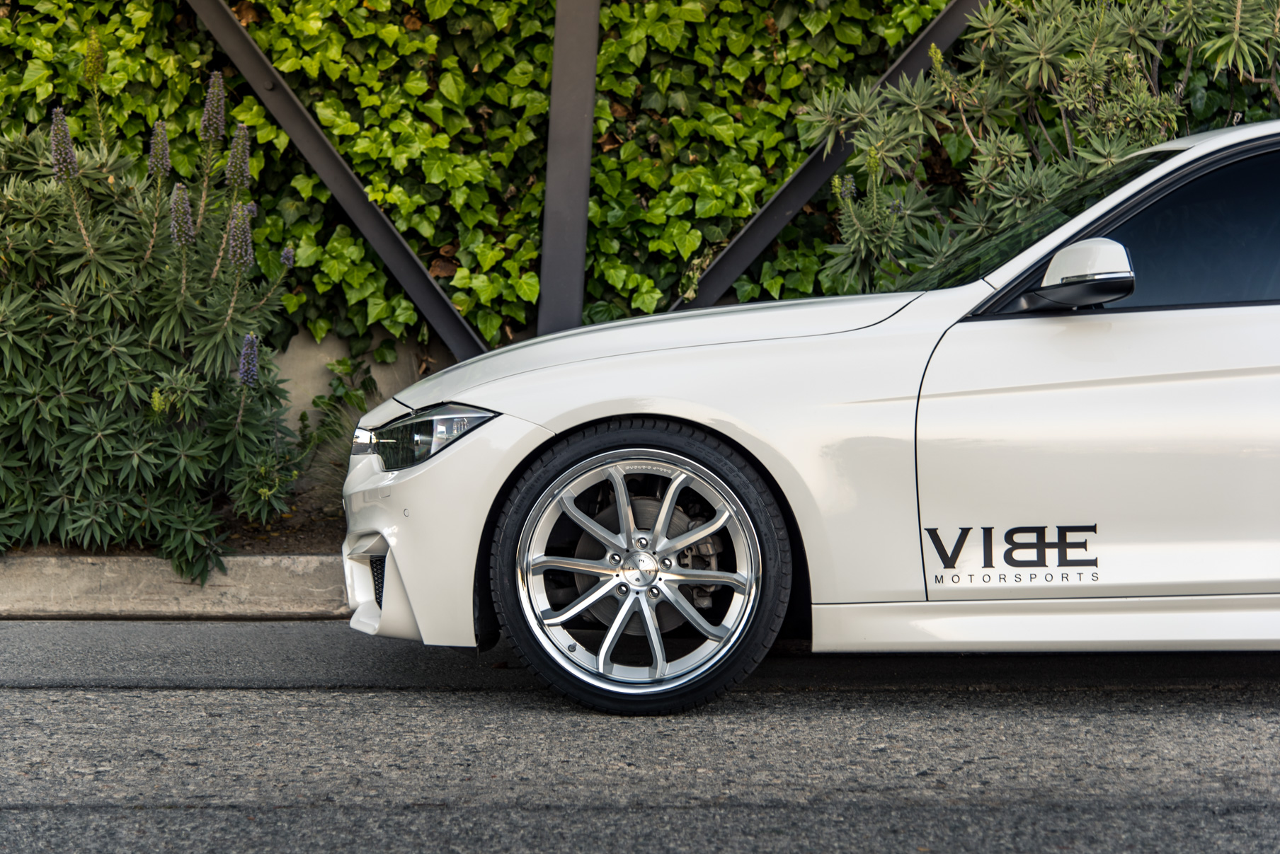 A 2014 BMW 328i on 20 Inch Staggered Silver with Chrome SS Lip Wheels