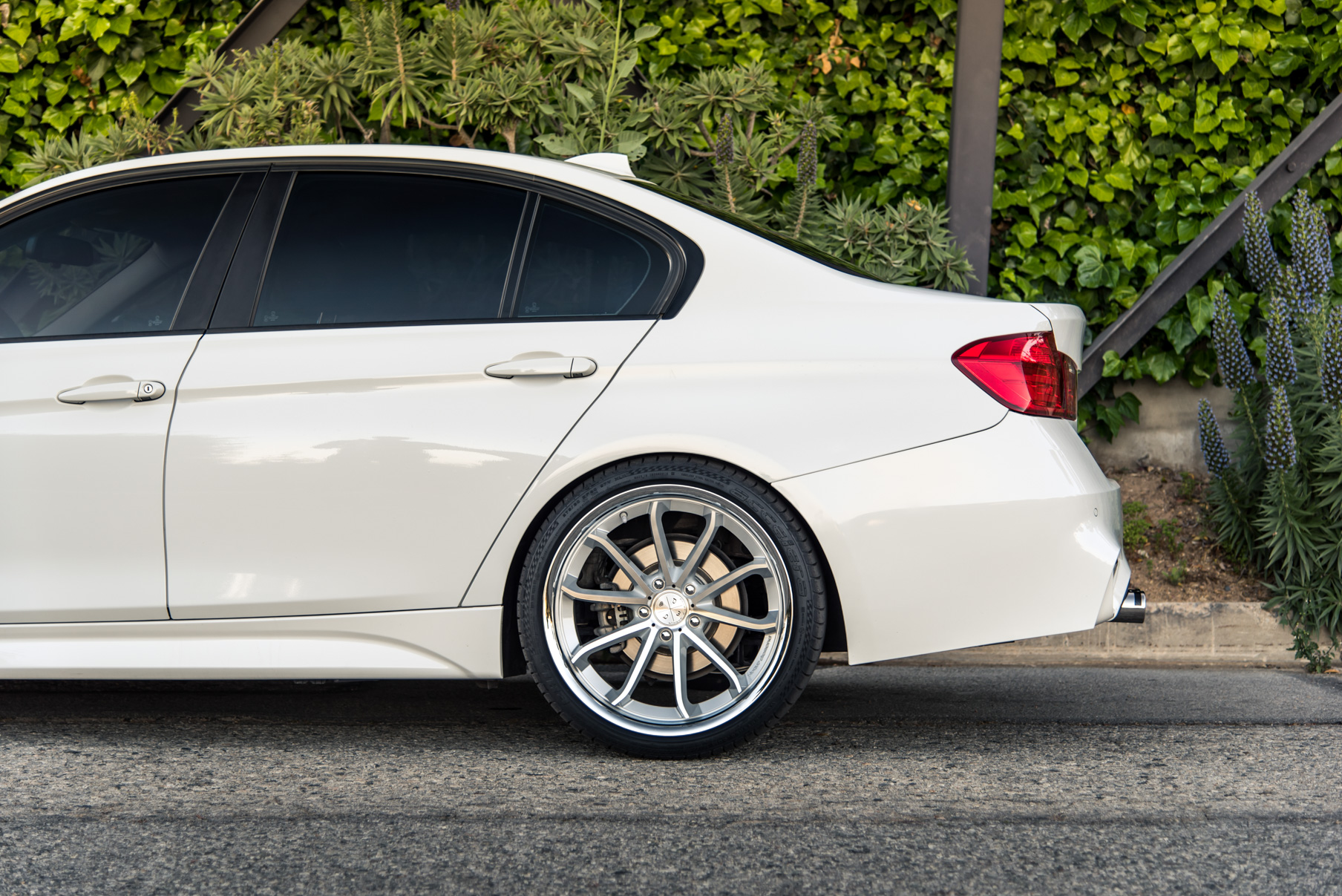A 2014 BMW 328i on 20 Inch Staggered Silver with Chrome SS Lip Wheels