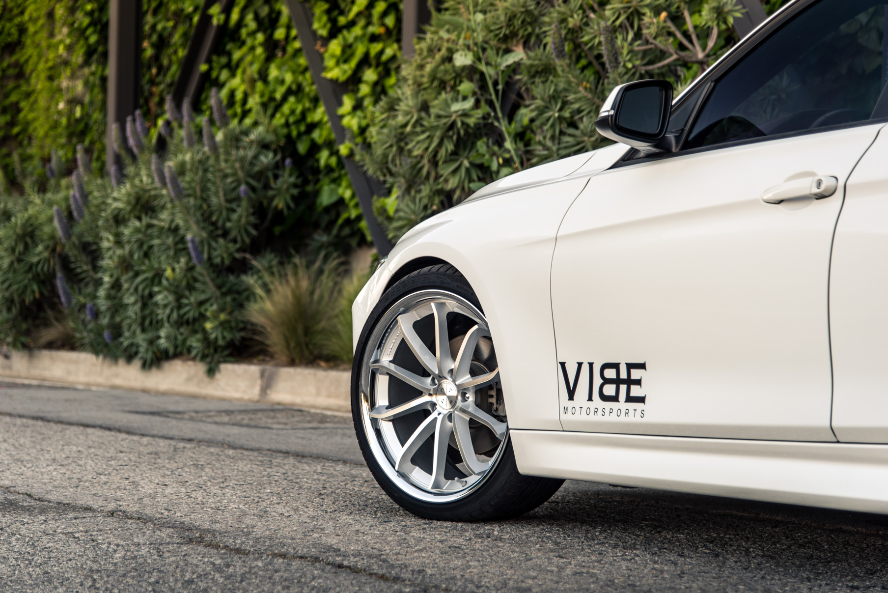 A 2014 BMW 328i on 20 Inch Staggered Silver with Chrome SS Lip Wheels