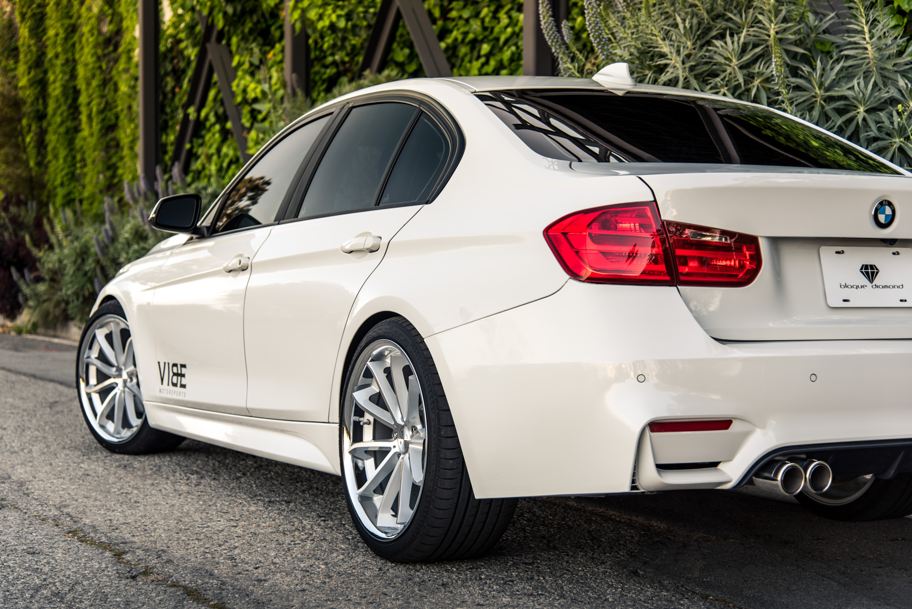 A 2014 BMW 328i on 20 Inch Staggered Silver with Chrome SS Lip Wheels