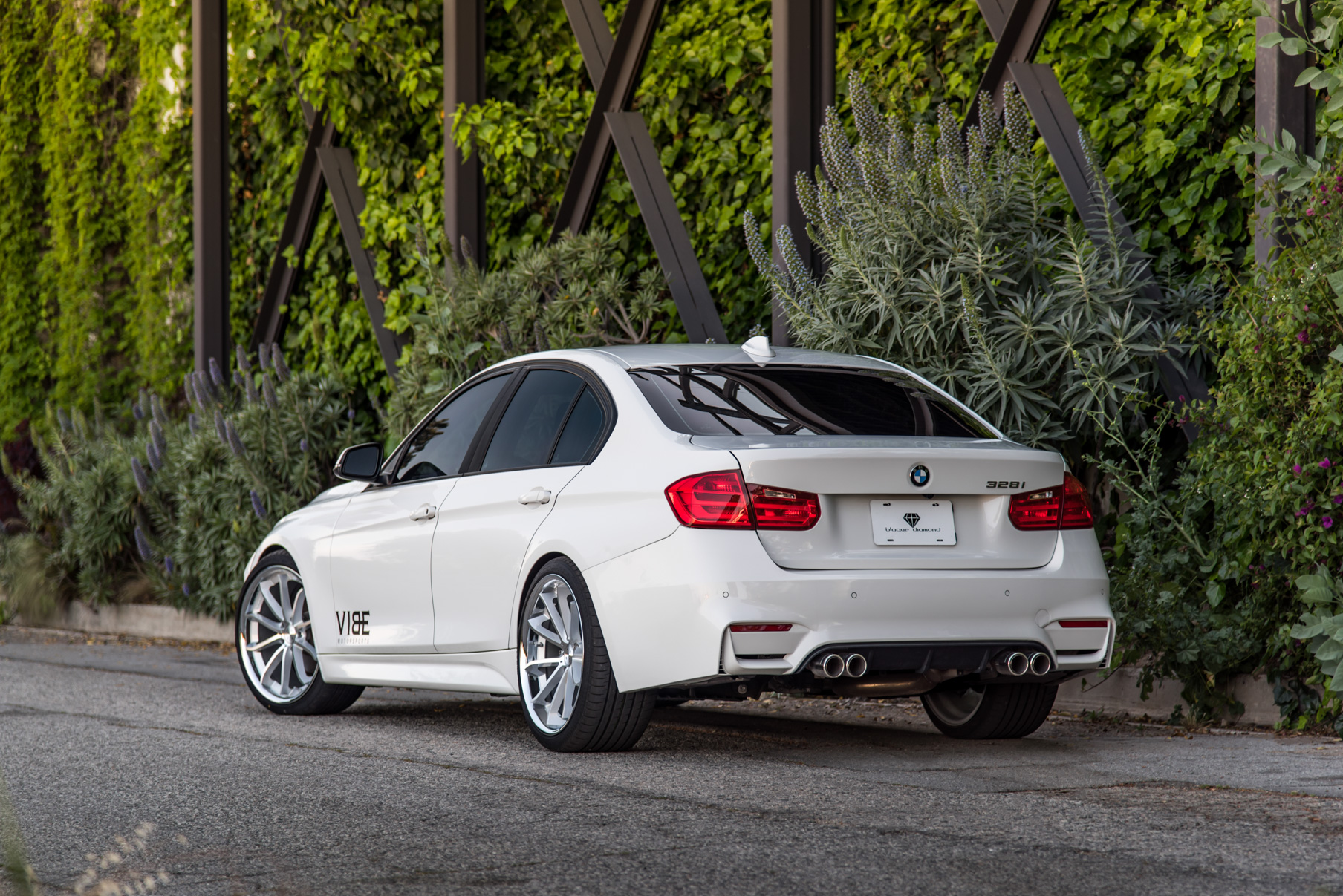 A 2014 BMW 328i on 20 Inch Staggered Silver with Chrome SS Lip Wheels