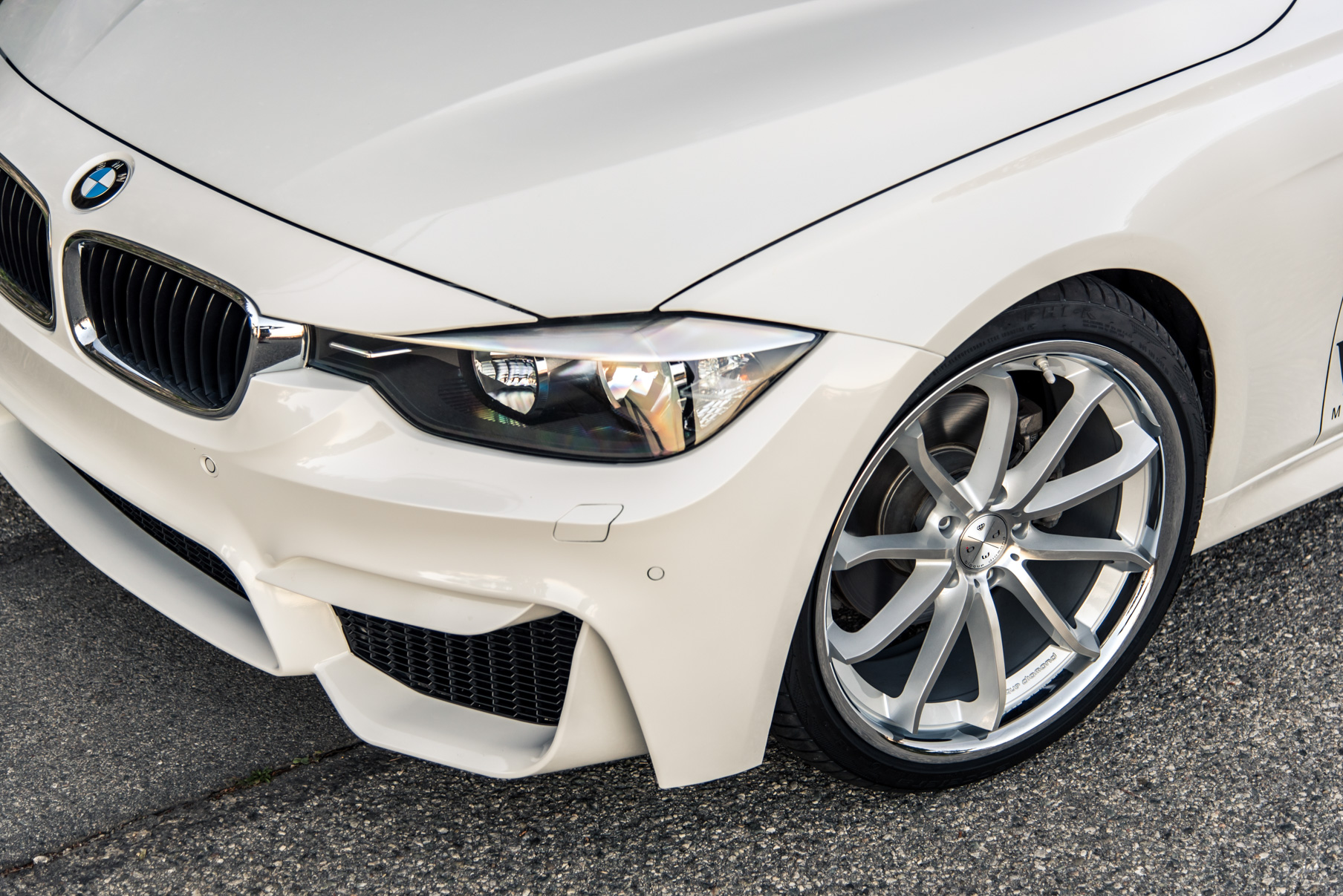 A 2014 BMW 328i on 20 Inch Staggered Silver with Chrome SS Lip Wheels
