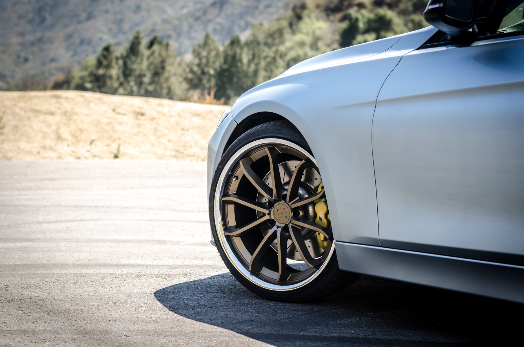 A 2014 328i on 20 Inch Blaque Diamond BD-23 Bronze Wheels