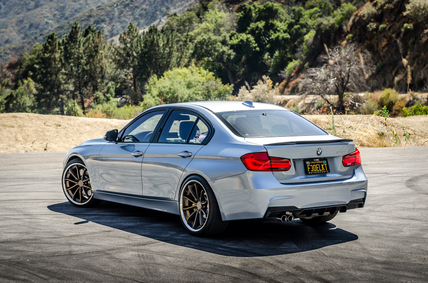 A 2014 328i on 20 Inch Blaque Diamond BD-23 Bronze Wheels