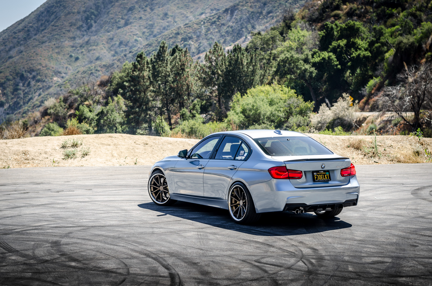 A 2014 328i on 20 Inch Blaque Diamond BD-23 Bronze Wheels