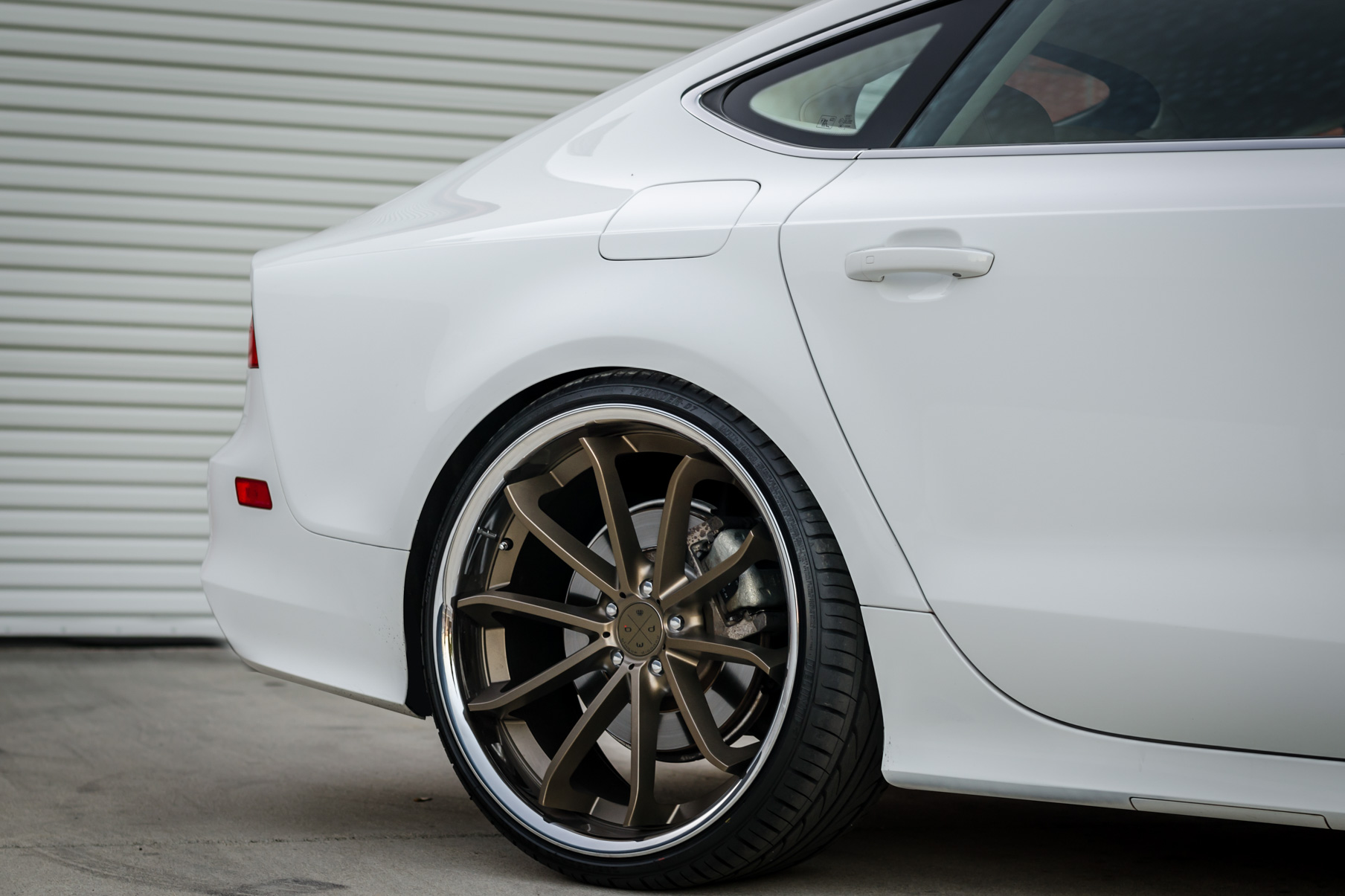 A White 2016 Audi A7 on 20 Inch Blaque Diamond BD-23 Bronze with Chrome SS Lip Wheels